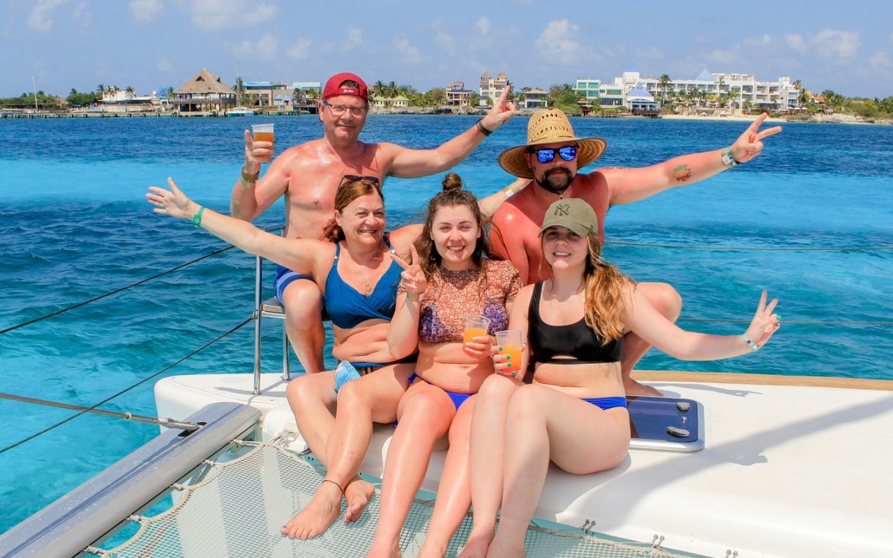 Sailing across turquoise waters, enjoying sun, sea breeze, and endless smiles today