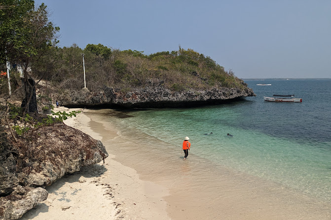 tourist strolling at beach