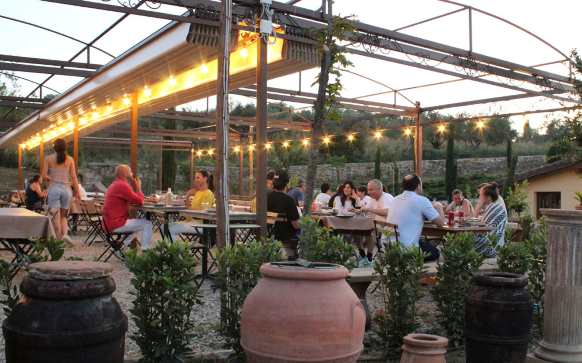 Enjoy authentic Tuscan dining prepared with fresh local ingredients in a rustic setup