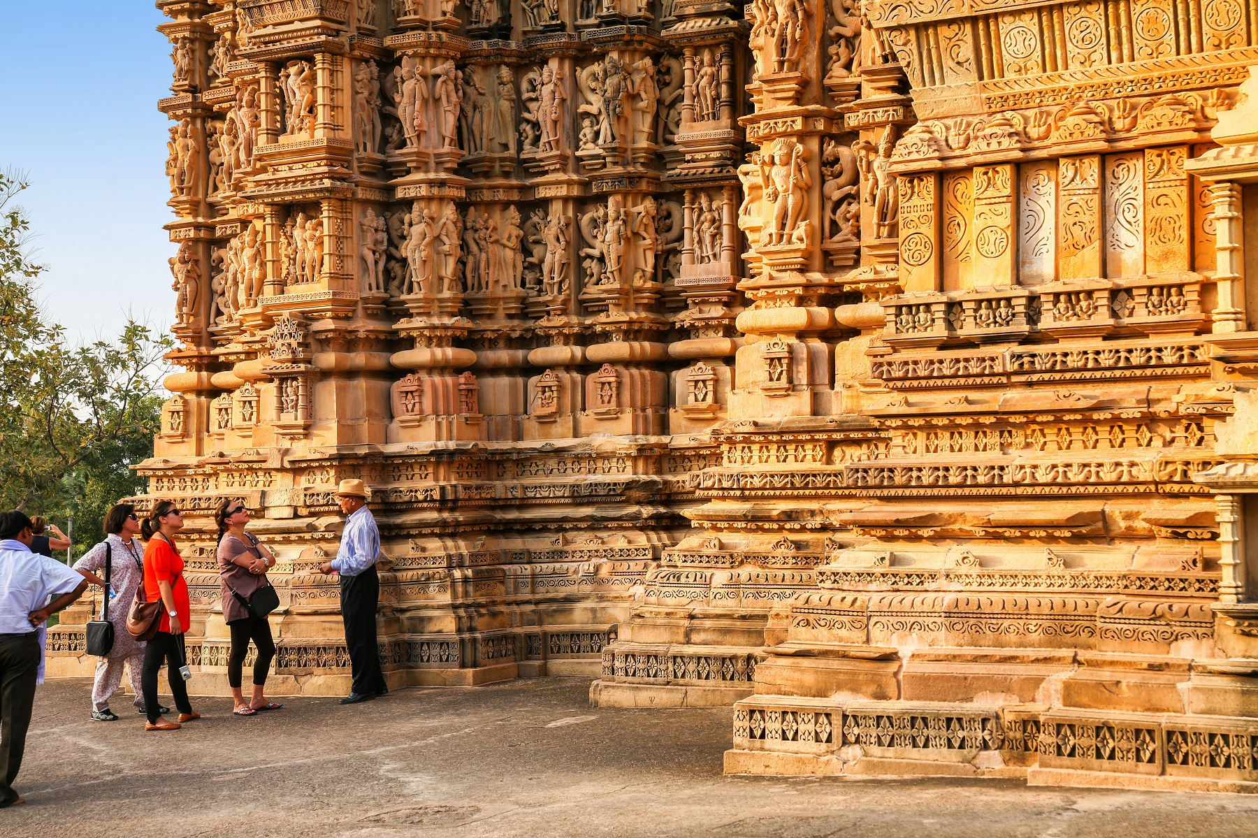 Our guide explain history about Khajuraho Temple to Tourist.