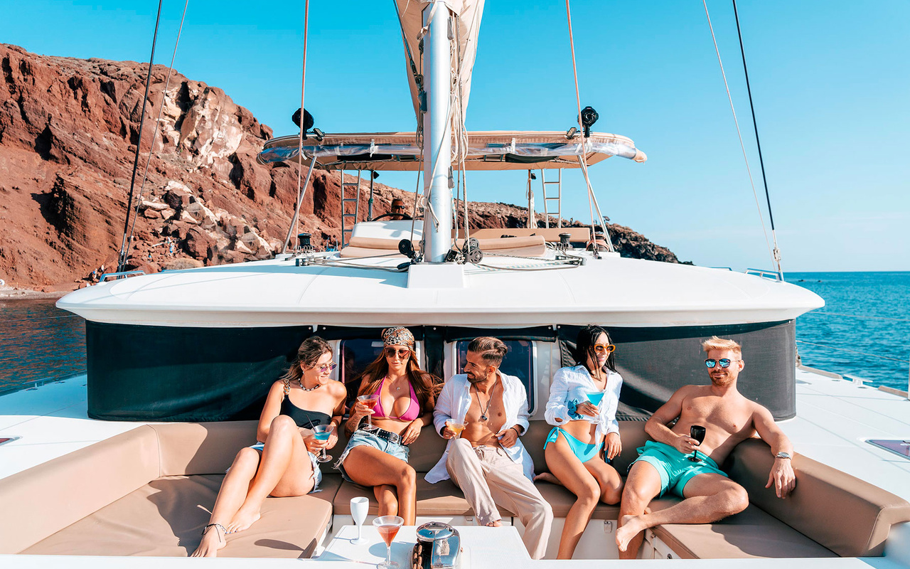 Santorini Luxury Sunset Cruise with Dinner, Drinks and Transfers