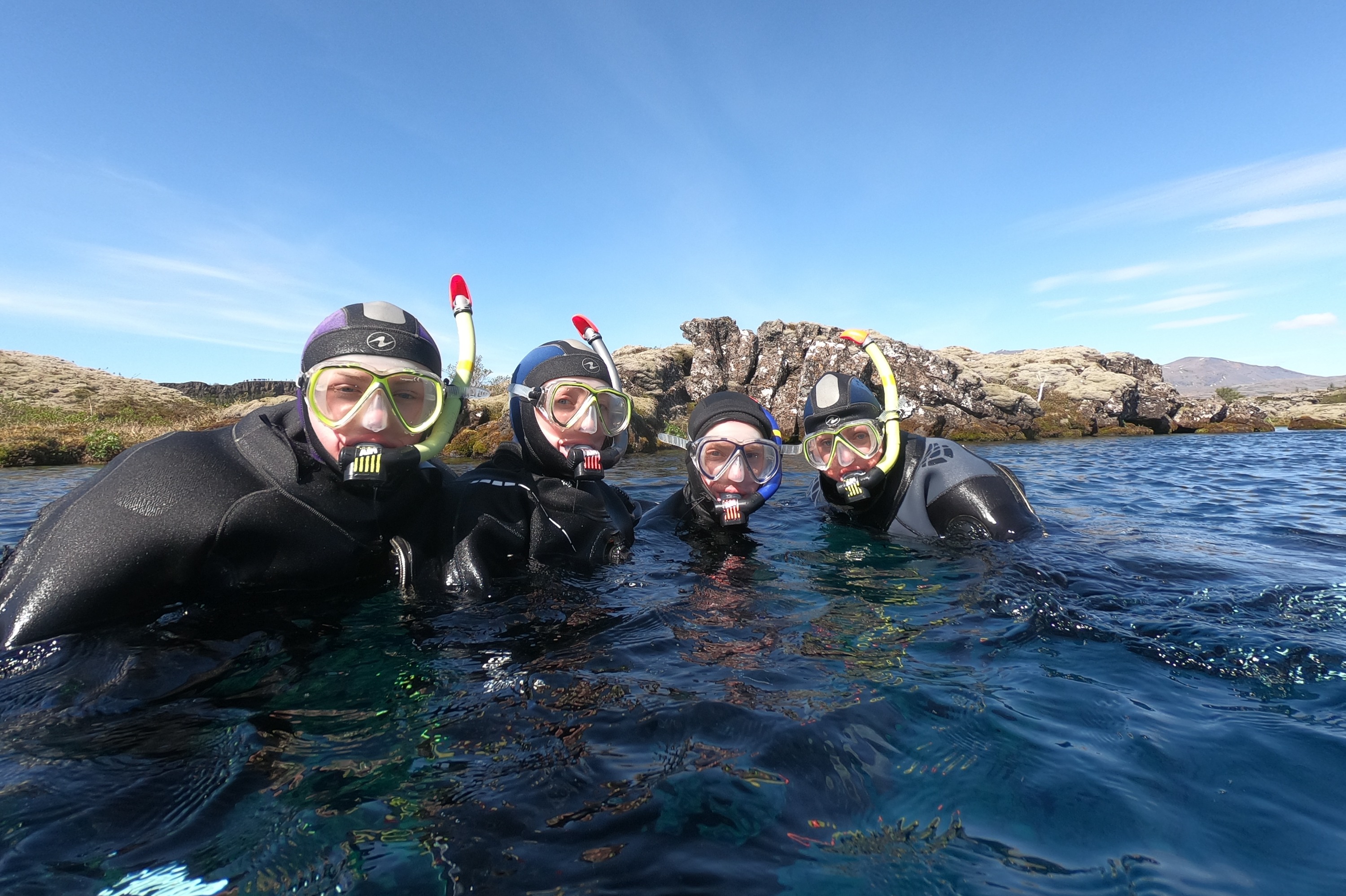 a group picture of participants snorkeling in silfra