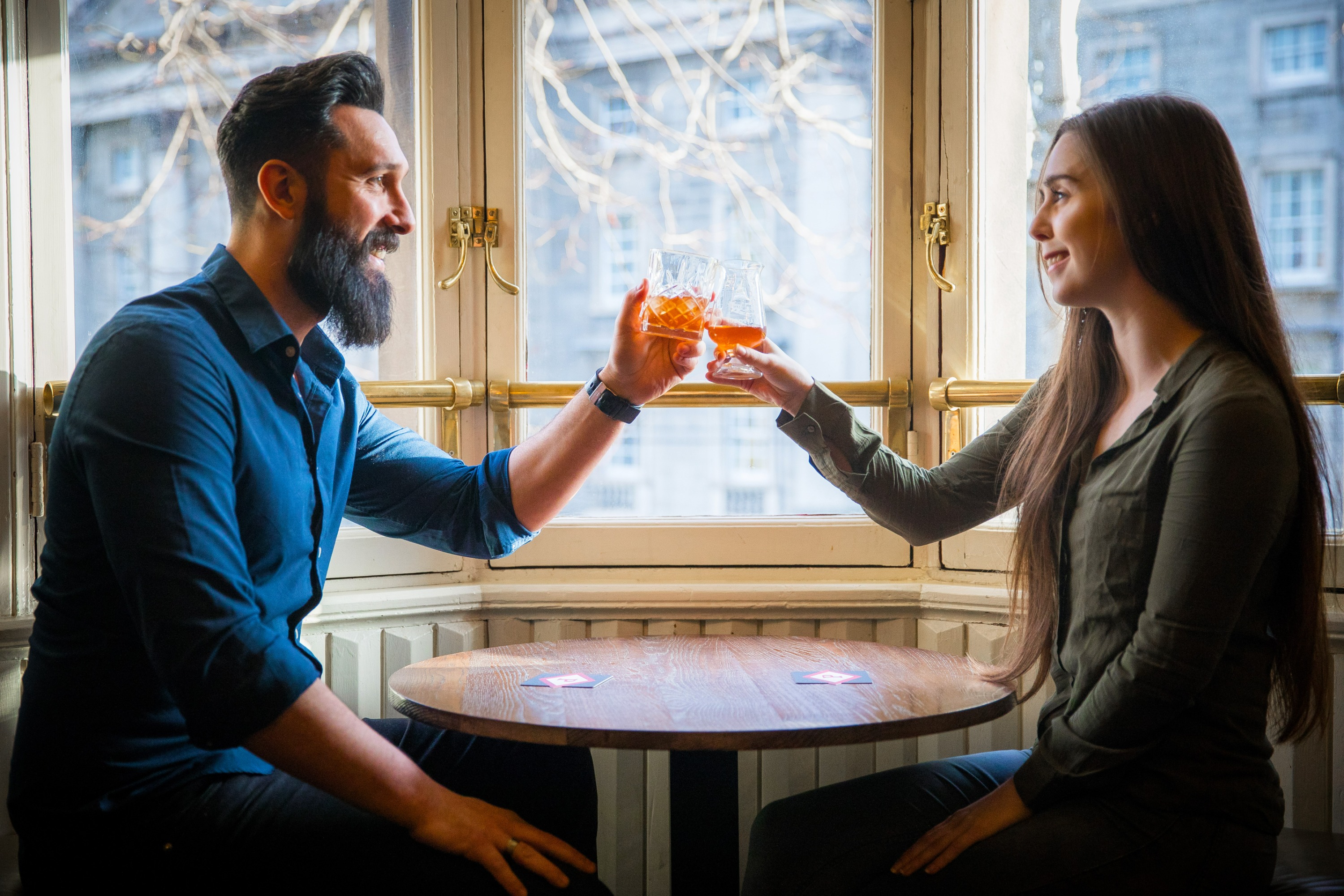 Guests enjoying chatting and whiskey tasting