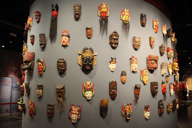 masks hanging on wall in Jinsha Site Museum for chengdu private day tour