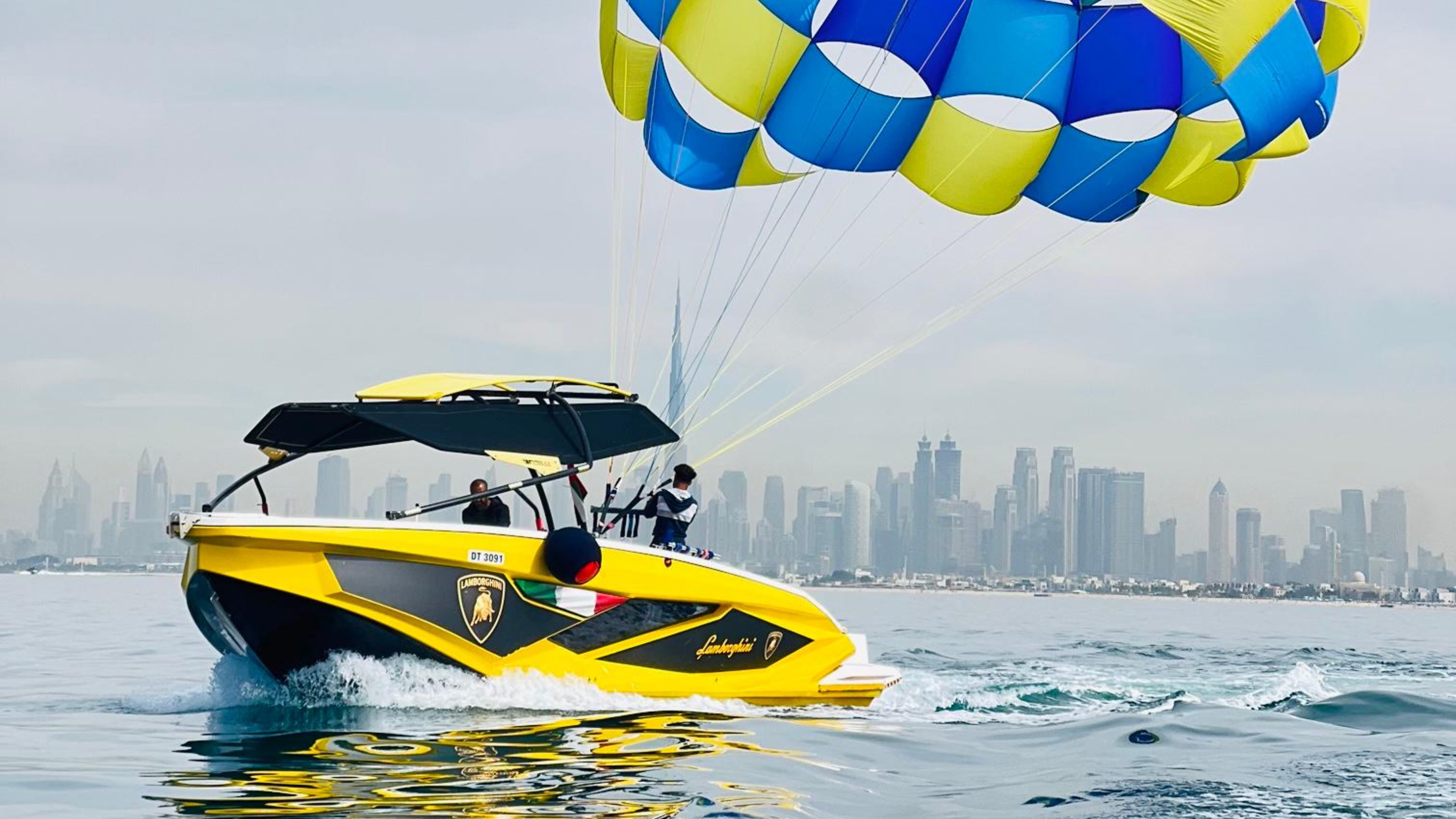 Experience pure freedom soaring high above golden sands and glittering architecture