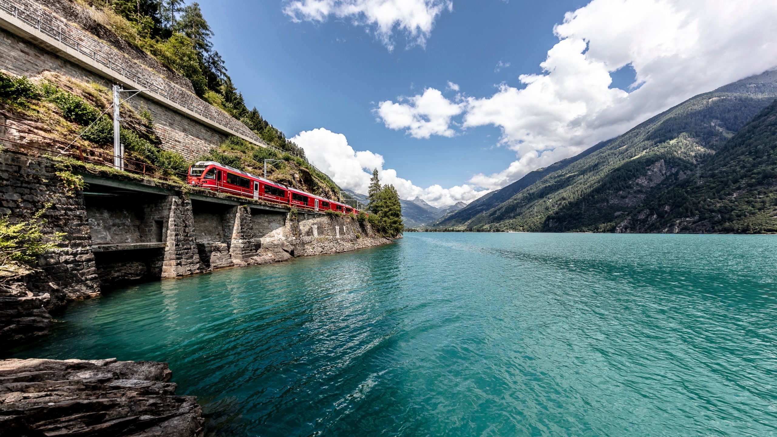 Crystal-clear alpine lakes and majestic mountains surround the elegant town of St. Moritz