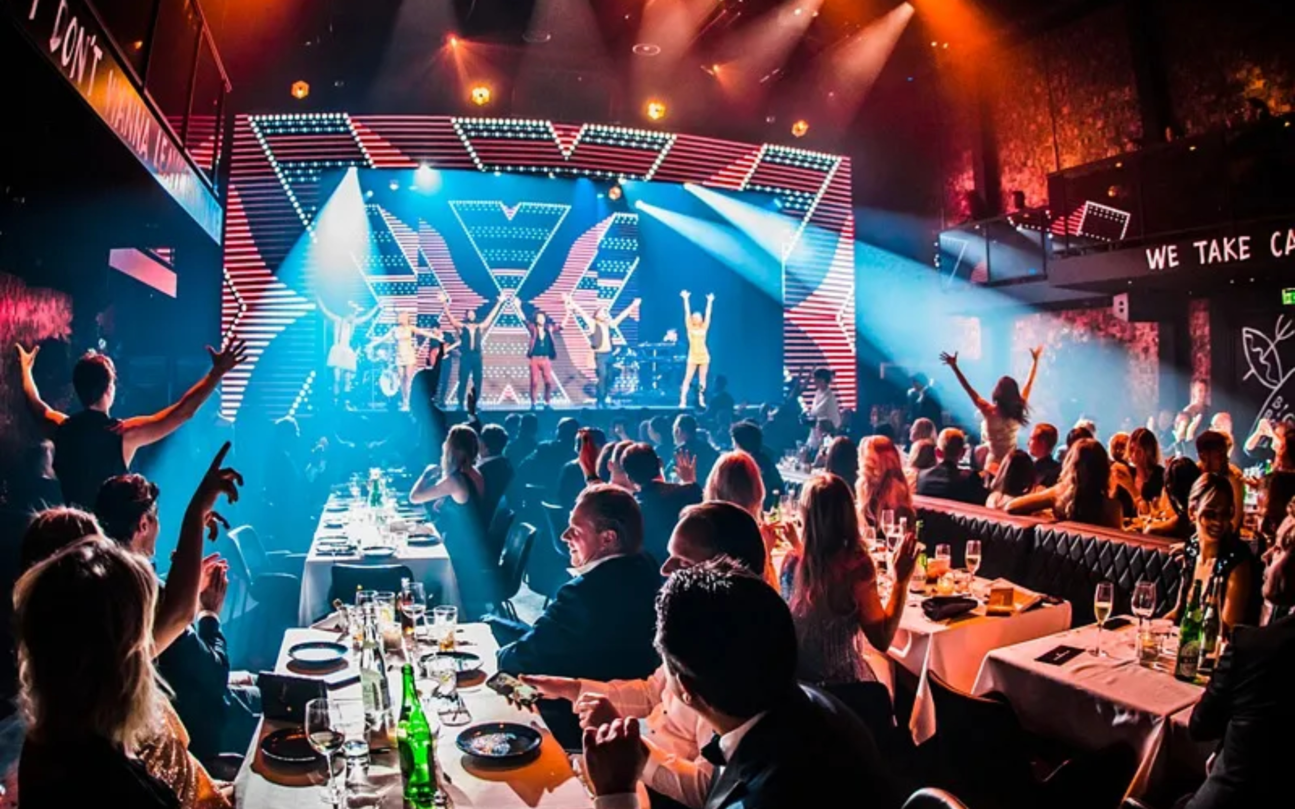 Feast on a delicious three-course shared dining dinner while basking in the party atmosphere