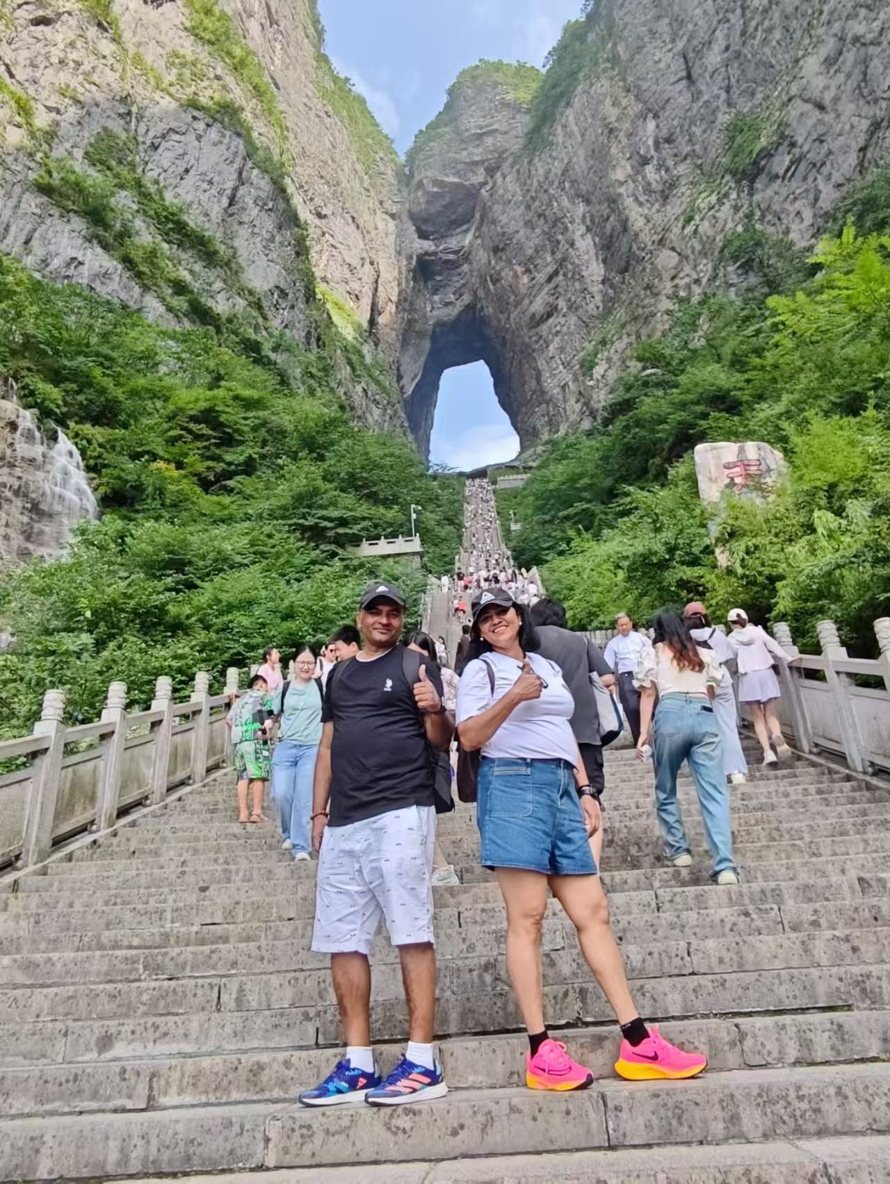 Continue to walk downstairs along the super steep 999-steps with the highest inclination up to 45°, which is the only access to Tianmen Cave from the foot of the mountain for a lot of prayers worshiping there. Your wonderful tour ends with hotel drop off.