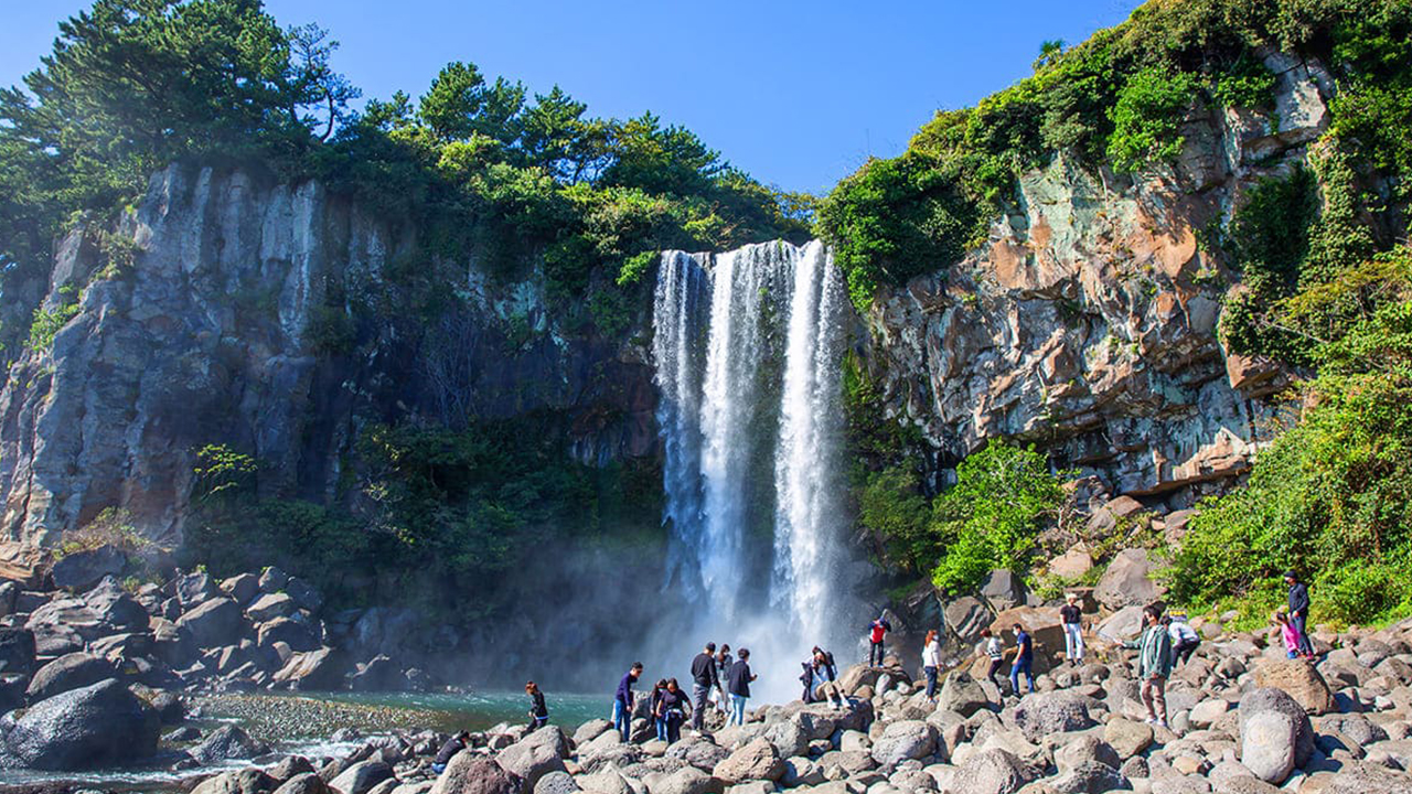 One of Jeju’s most iconic waterfalls, where fresh water dramatically flows directly into the sea, creating a powerful and unique coastal scene.
