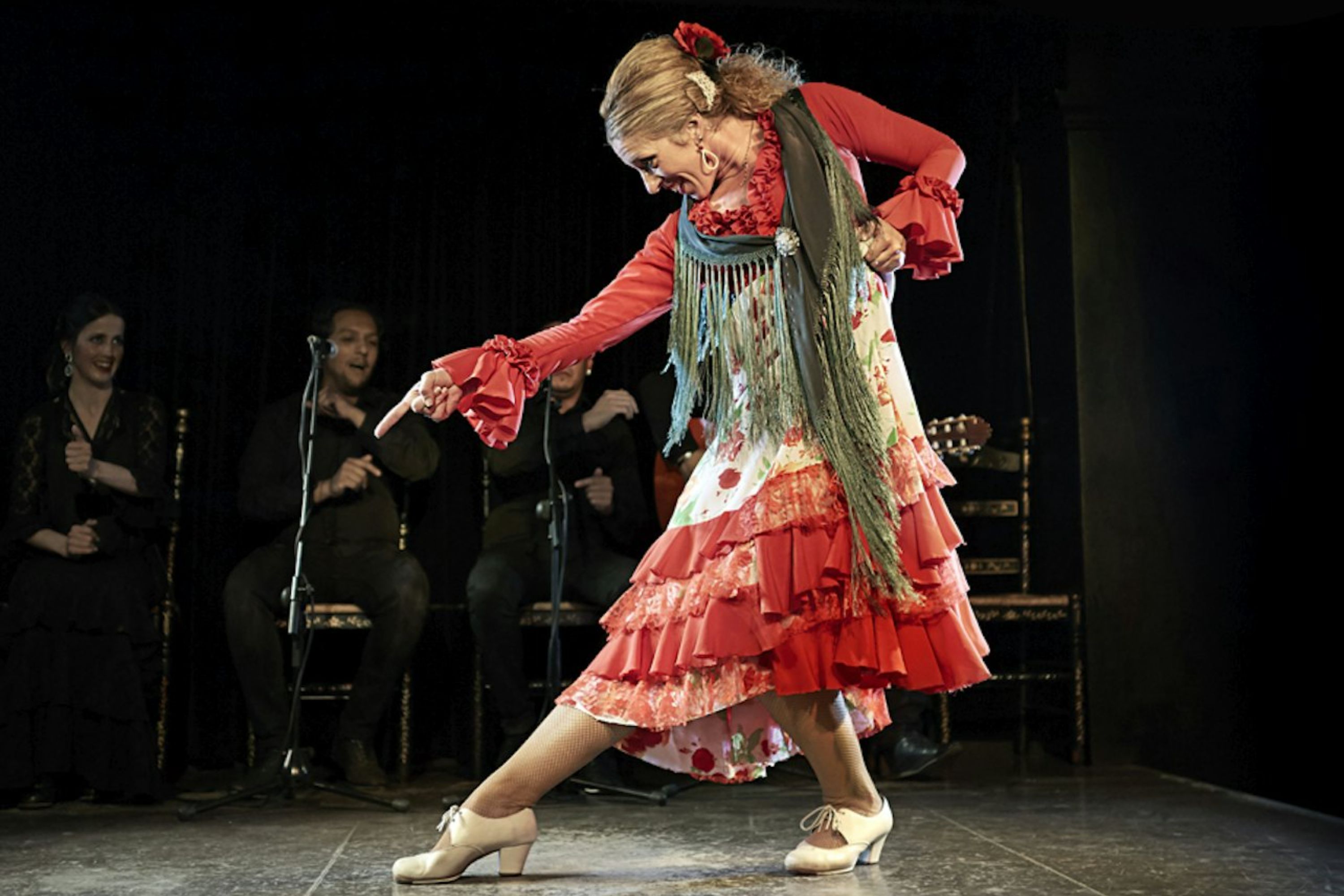 Feel the intensity of flamenco as dancers perform with passion and grace