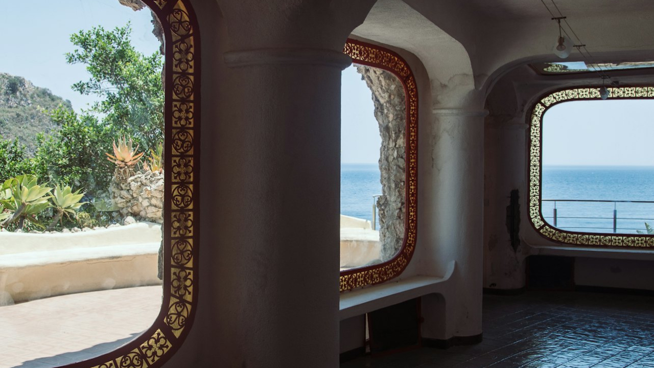 Explore the stunning Isola Bella, known as the Pearl of the Ionian Sea