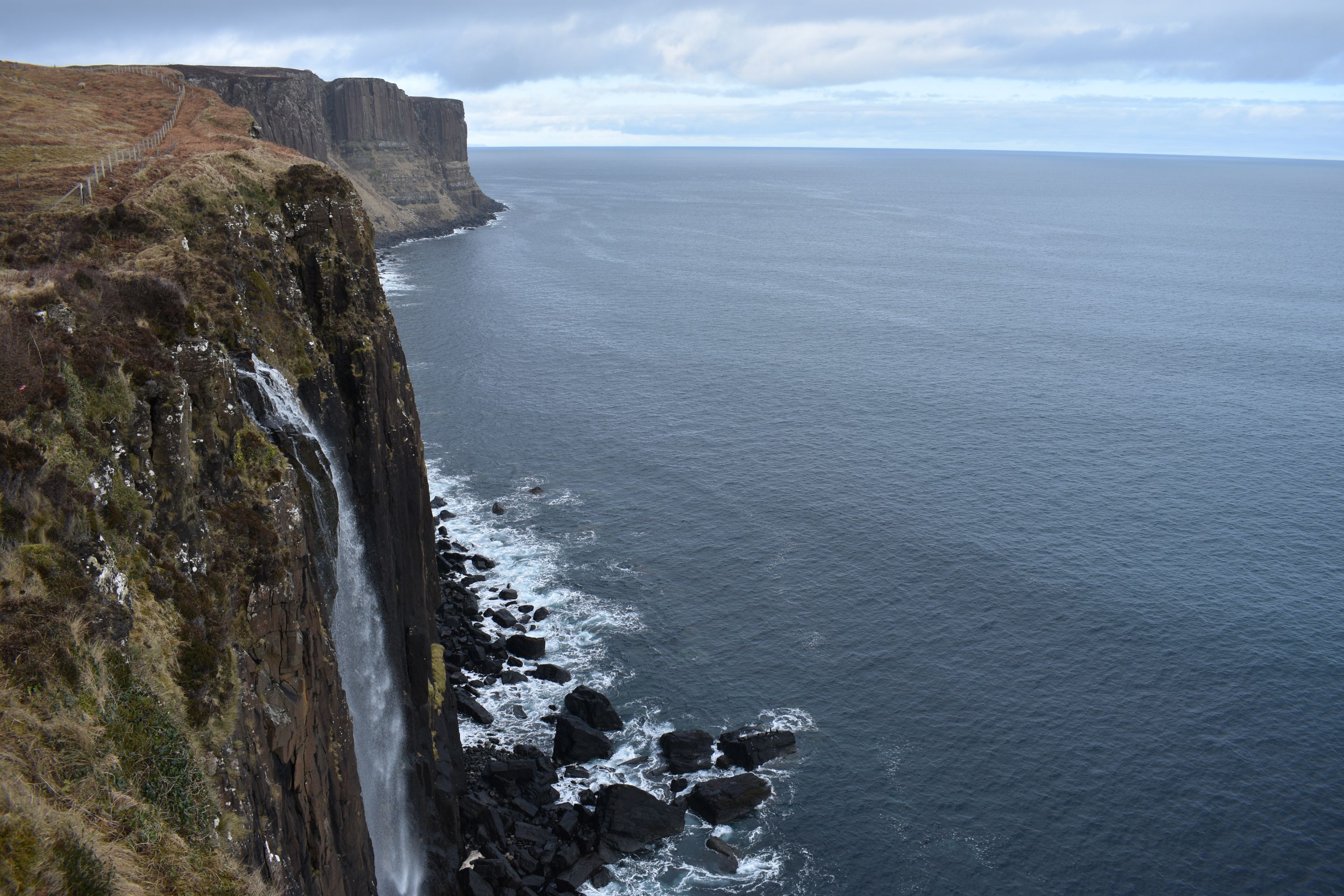 Admire Kilt Rock, a striking cliff formation that resembles a kilt and offers magnificent coastal views