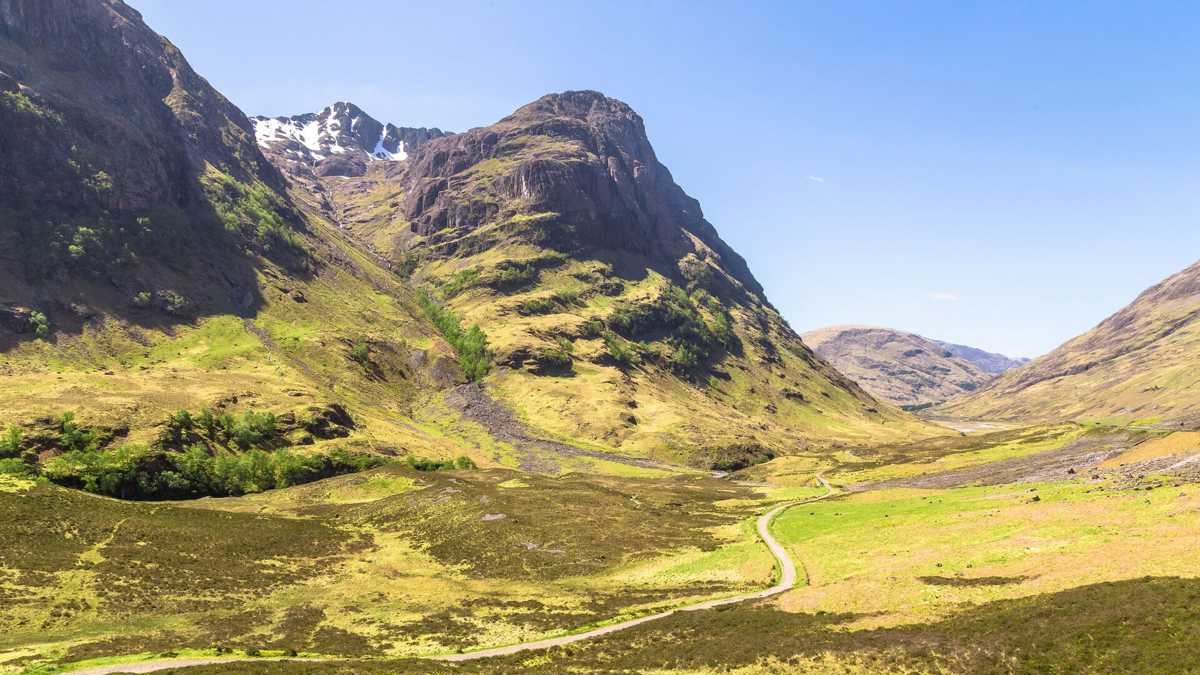 Glen Coe’s stunning peaks and vast valley create a dramatic landscape, perfect for adventure seekers