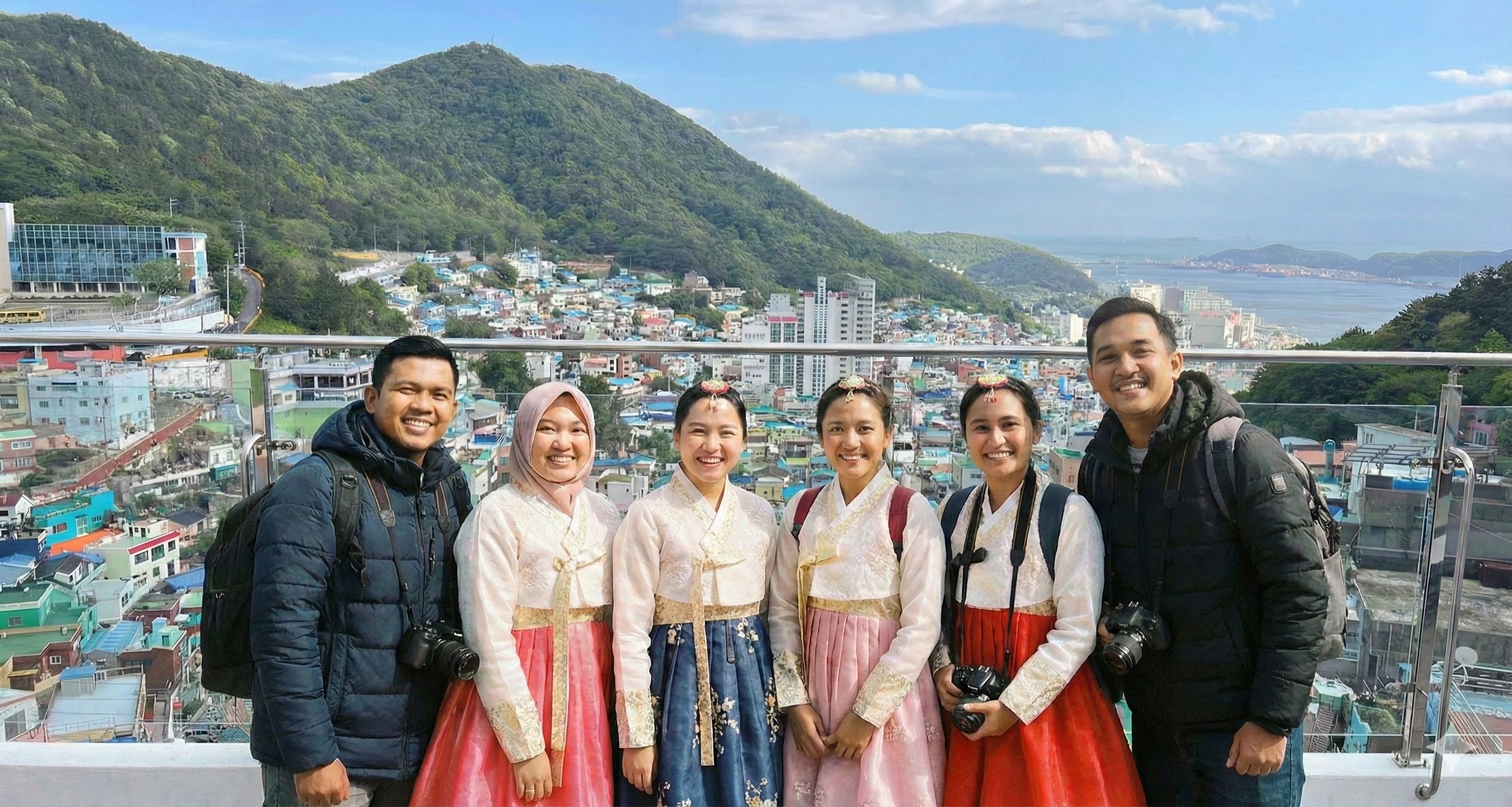 行程 5. 甘川洞文化村：以其異想天開的魅力而聞名，甘川洞文化村提供如畫般的風景、夢幻般的街道，以及無數您不容錯過的拍照機會。