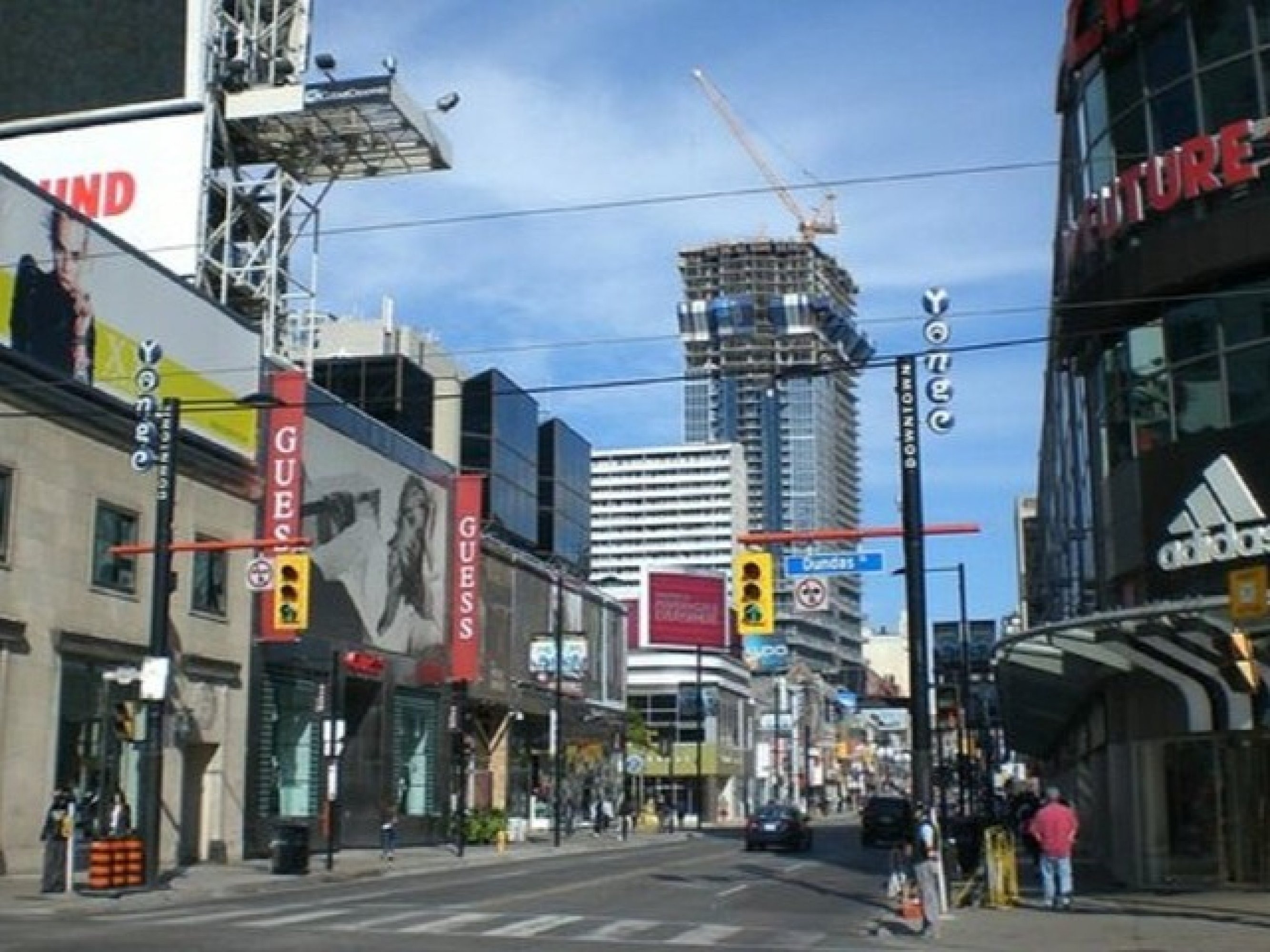 Explore the historic Distillery District, known for its cobblestone streets and unique shops
