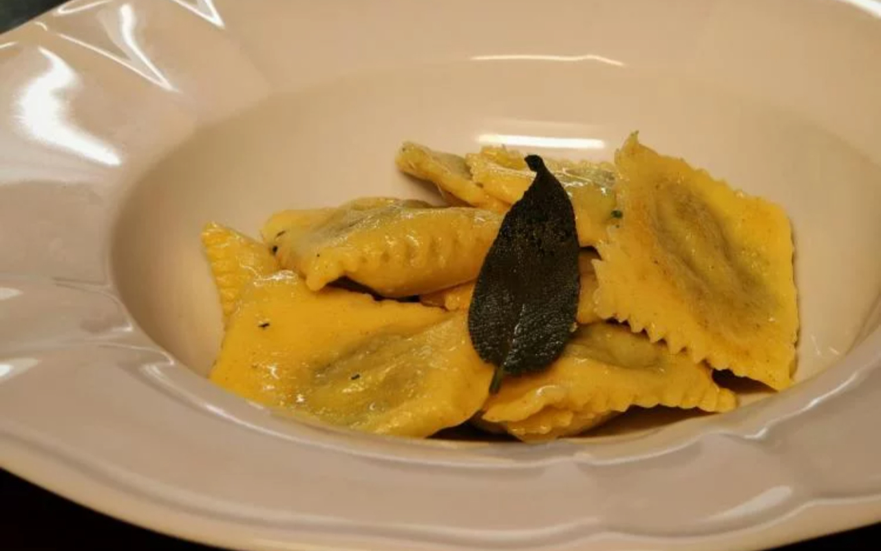 Enjoy a curated tasting of regional delicacies like handmade ravioli paired with local wines