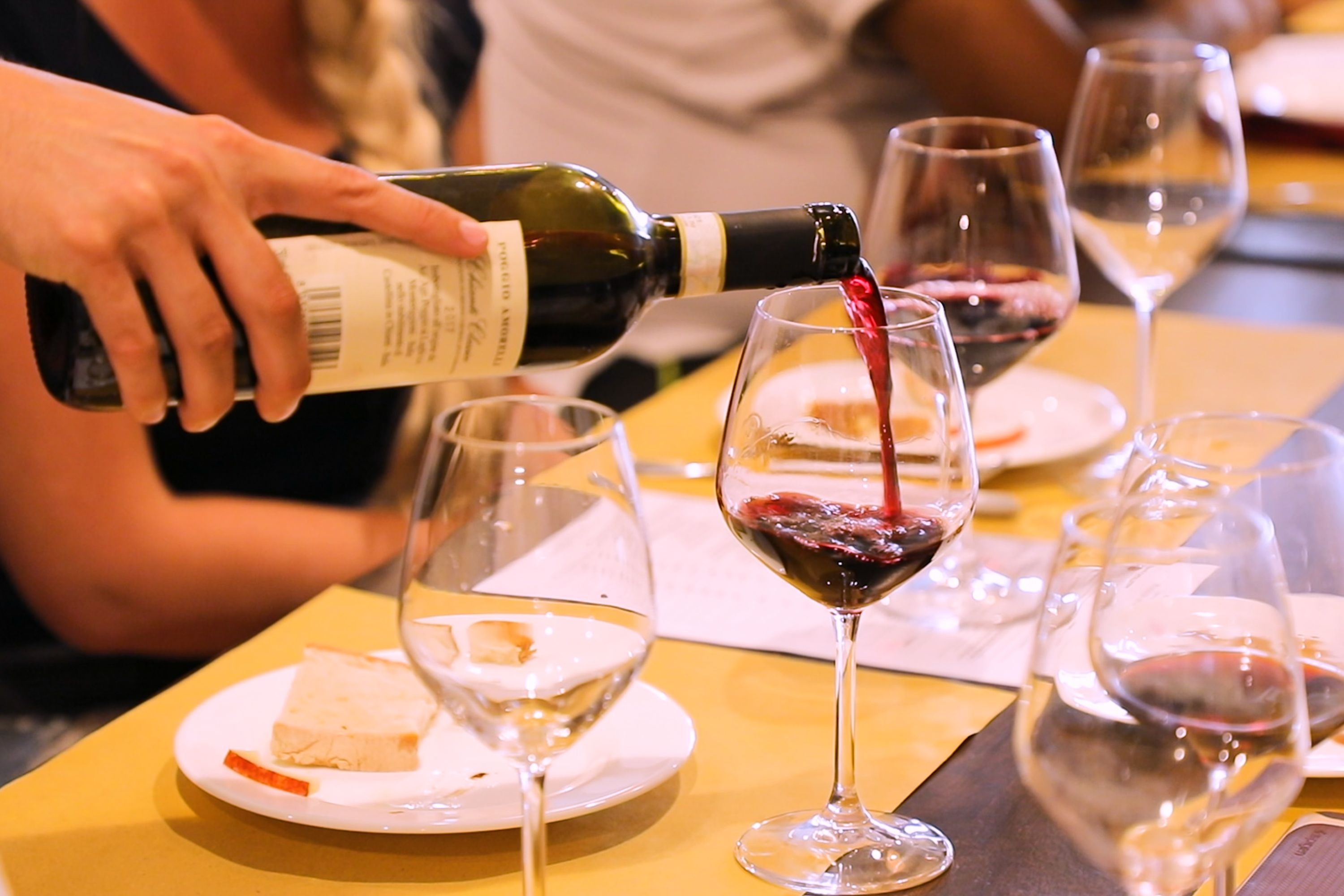 Savor a tasting of three fine wines and balsamic vinegar at a cozy Chianti winery