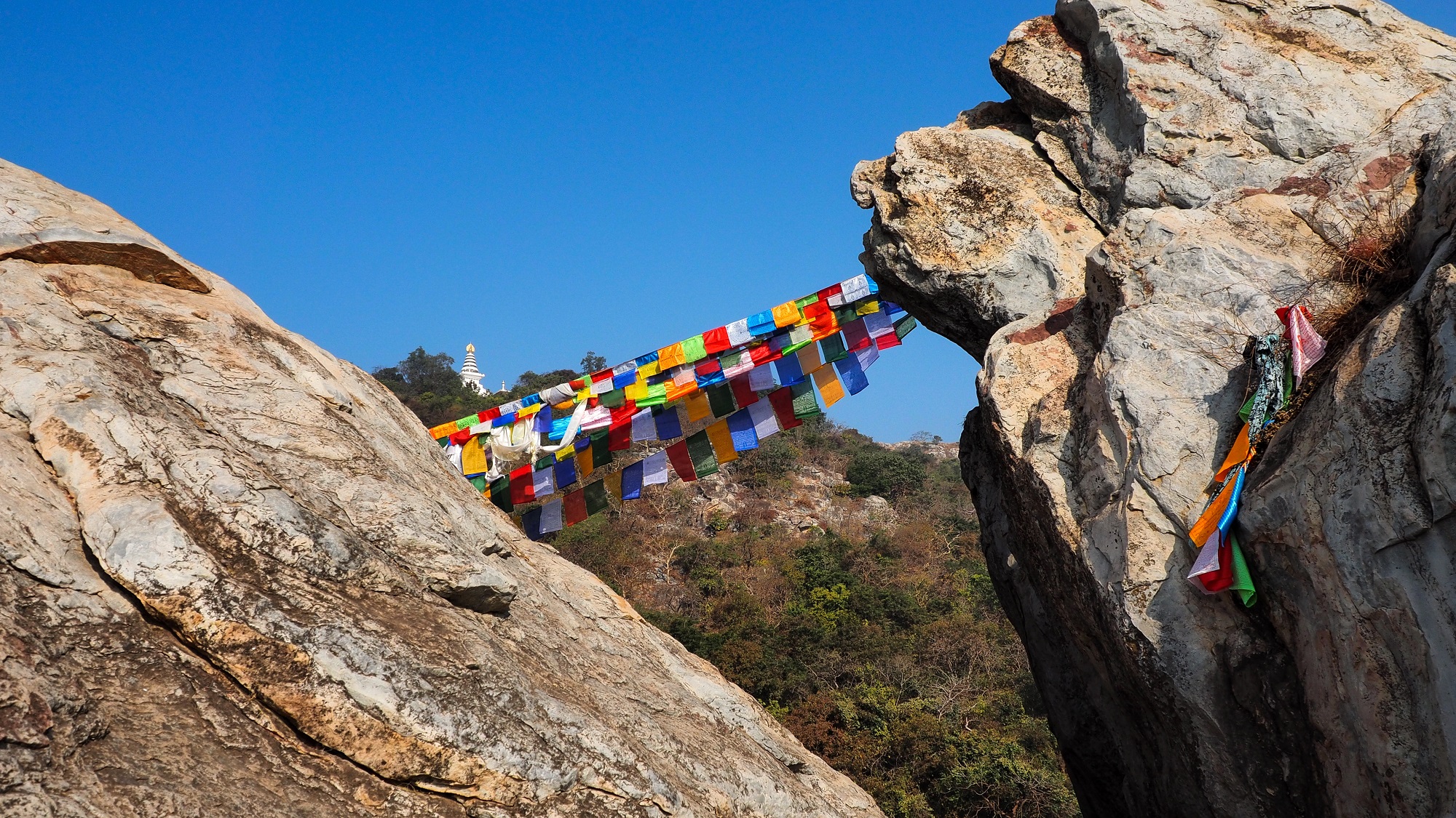 Scene from the top of Vulture_s Peak (Griddharaj Parvat) with view of Stupa and prayer flag in Rajgir.