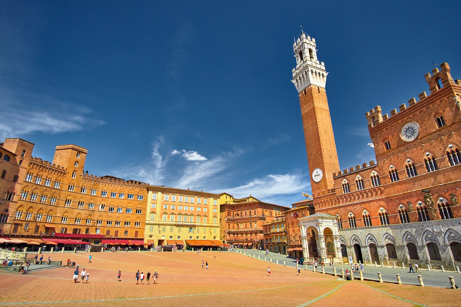 Visit Piazza del Campo, Siena's heart, dominated by the impressive Palazzo Pubblico (Town Hall)
