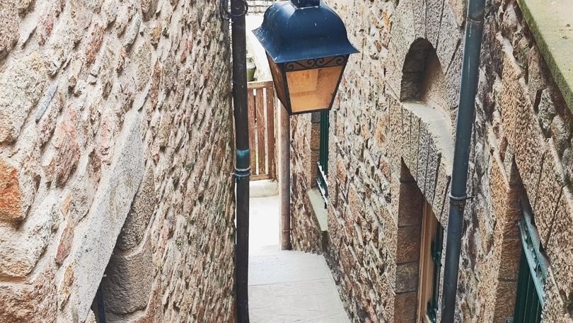 Stroll Mont Saint-Michel's narrow streets, alive with history, charm, and unique shops