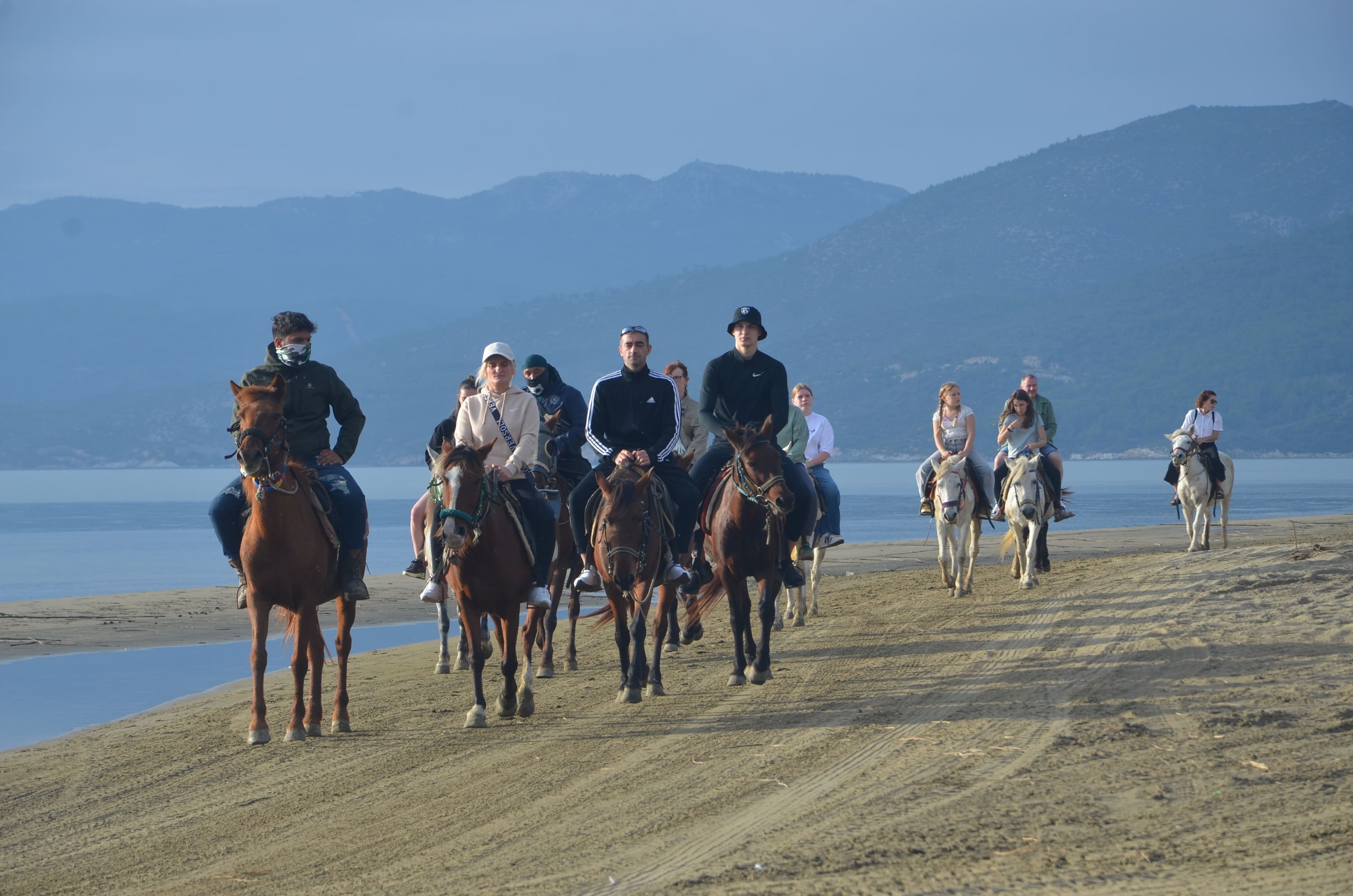 Enjoy a refreshing break at the sandy Kusadasi beach.