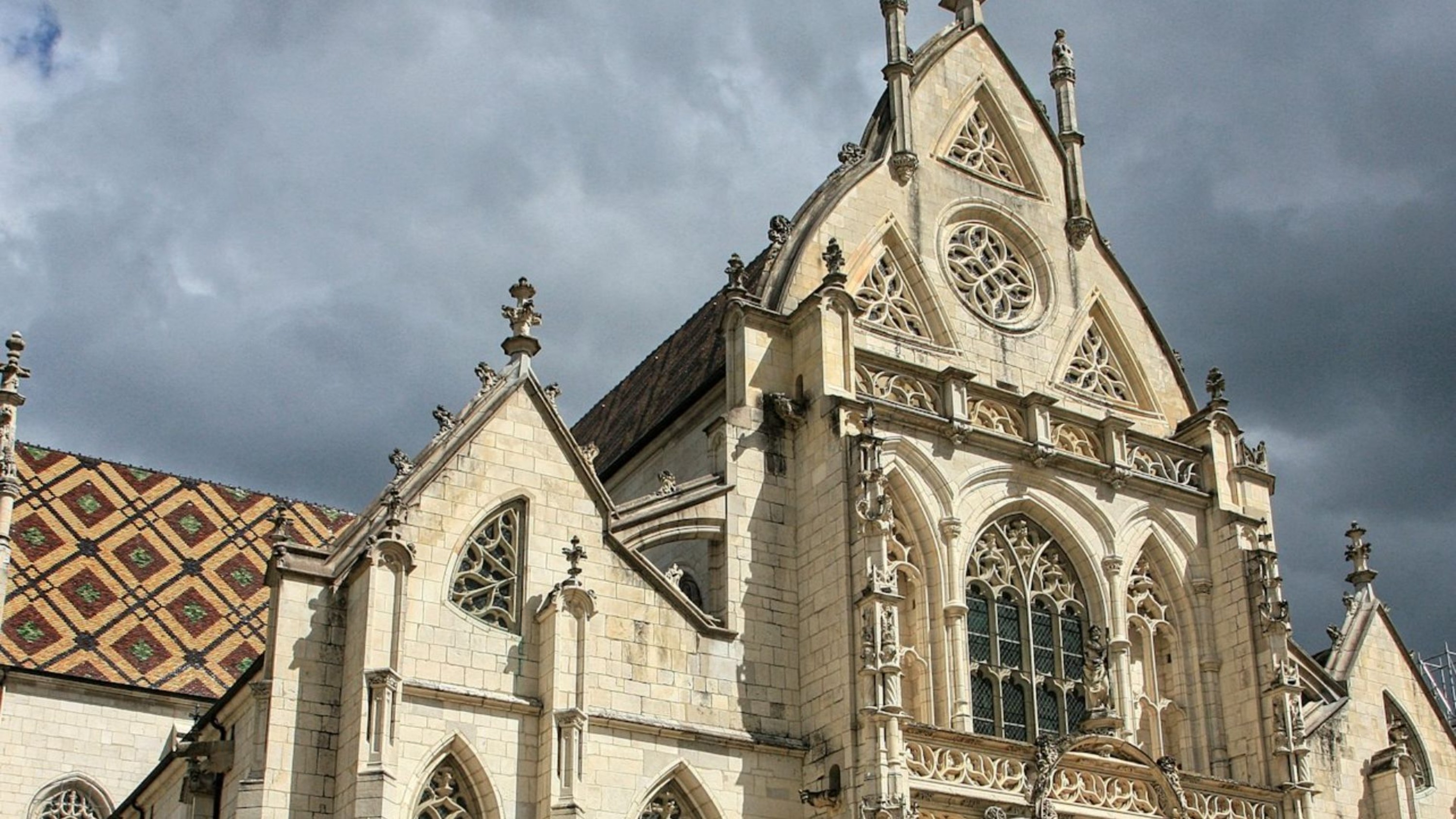 Explore serene cloisters and intricate designs from the 16th century