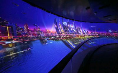 充滿科幻感的上海城市景觀，以藍紫色調營造出賽博朋克風格，彷彿將上海的繁華推向未來維度，給人強烈的視覺衝擊與對城市發展的暢想