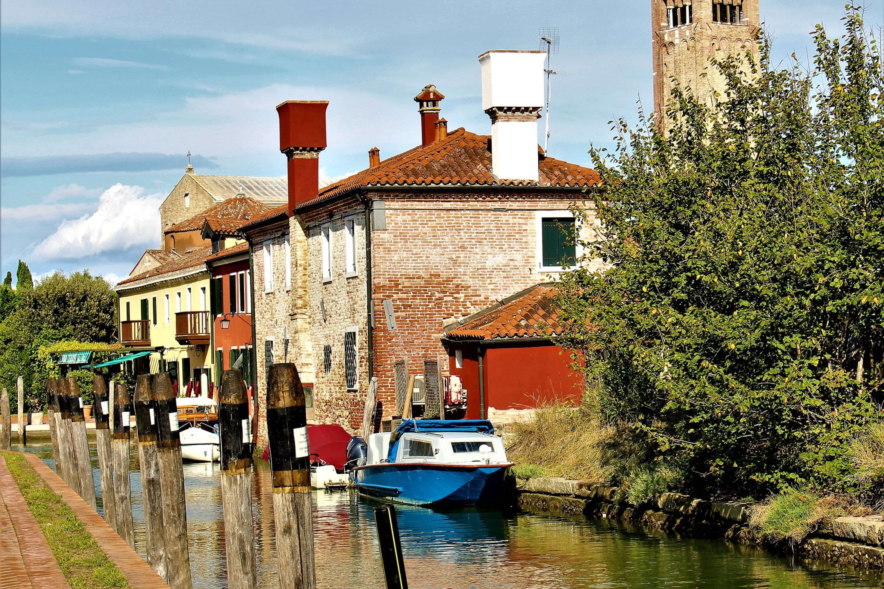 Cruise through the scenic Venetian Lagoon, enjoying the serene beauty of the surrounding waters
