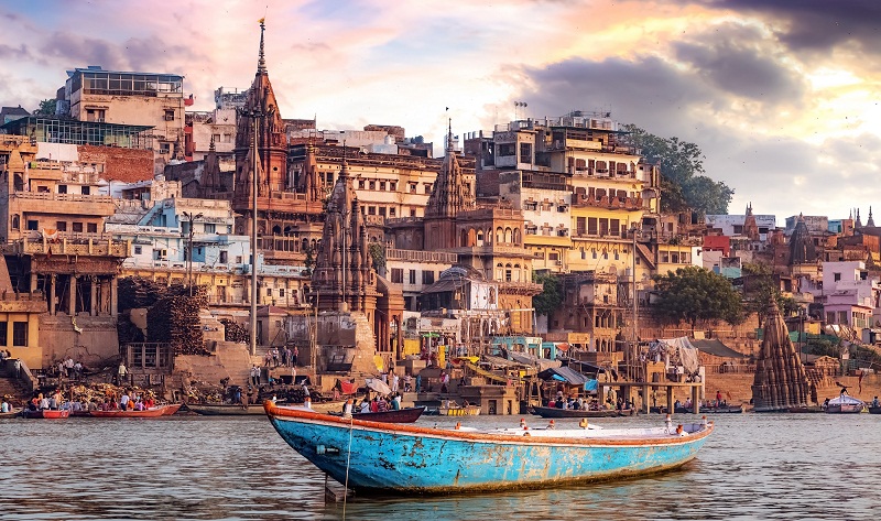 Varanasi city with ancient architecture. View of the holy Manikarnika ghat at Varanasi.