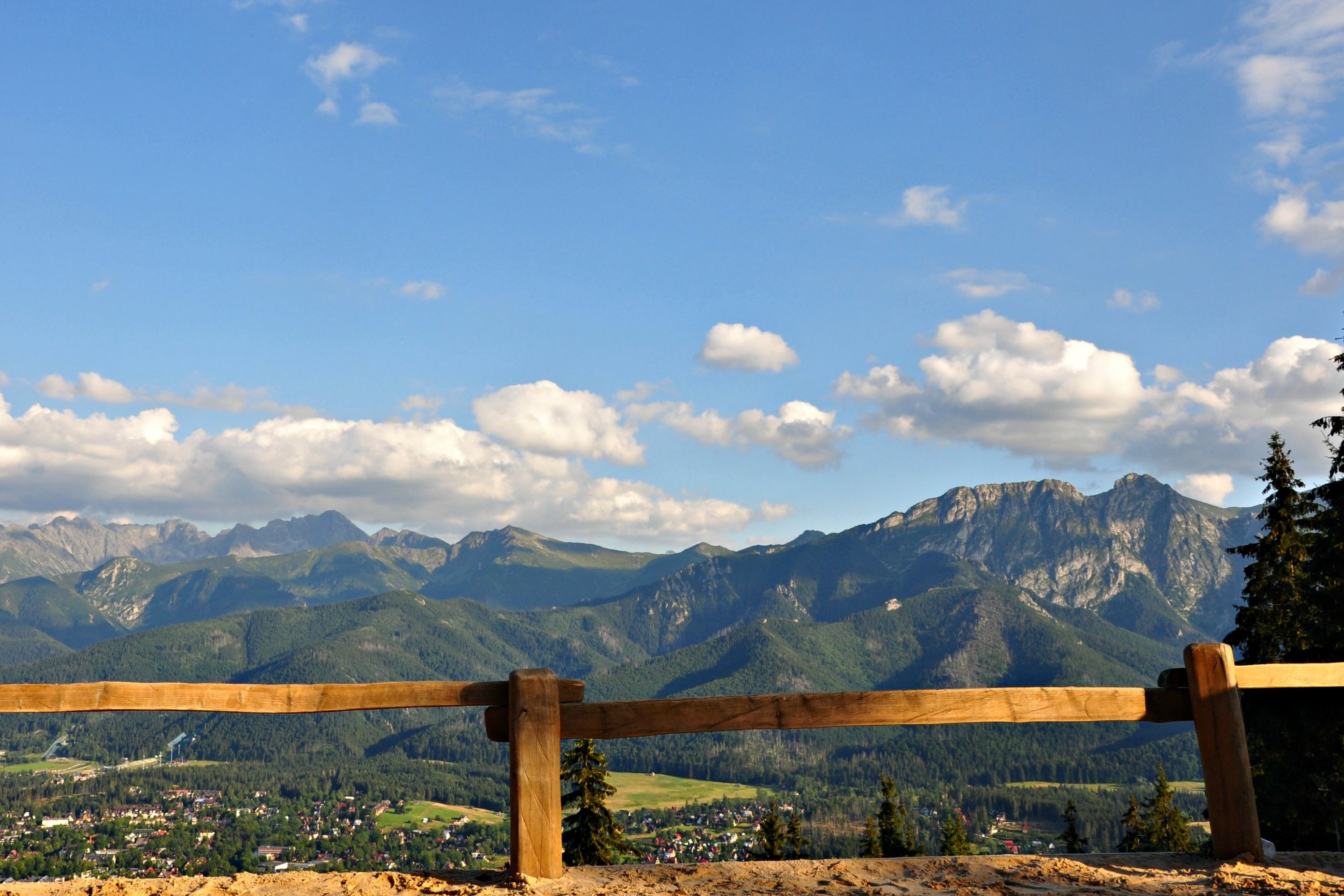 Marvel at the breathtaking vistas of the Tatra Mountains as you arrive in Zakopane