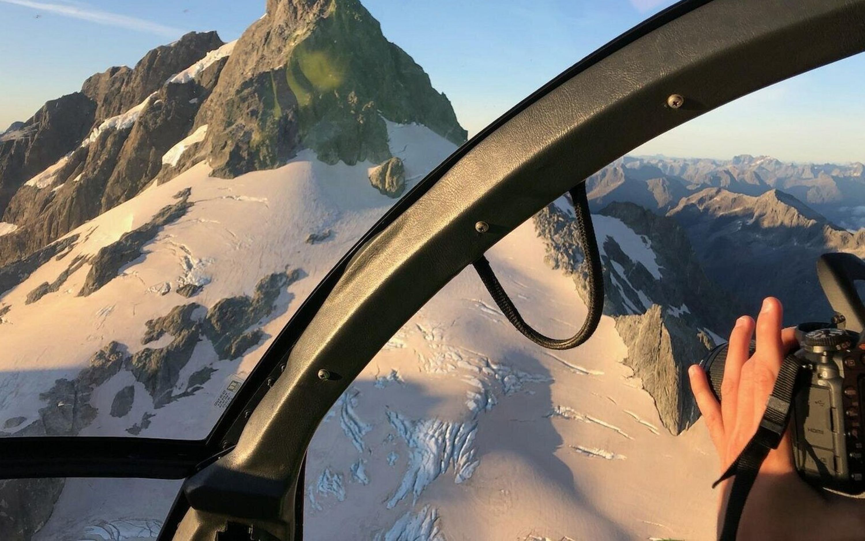 Experience breathtaking alpine views with a snow landing helicopter adventure in Queenstown
