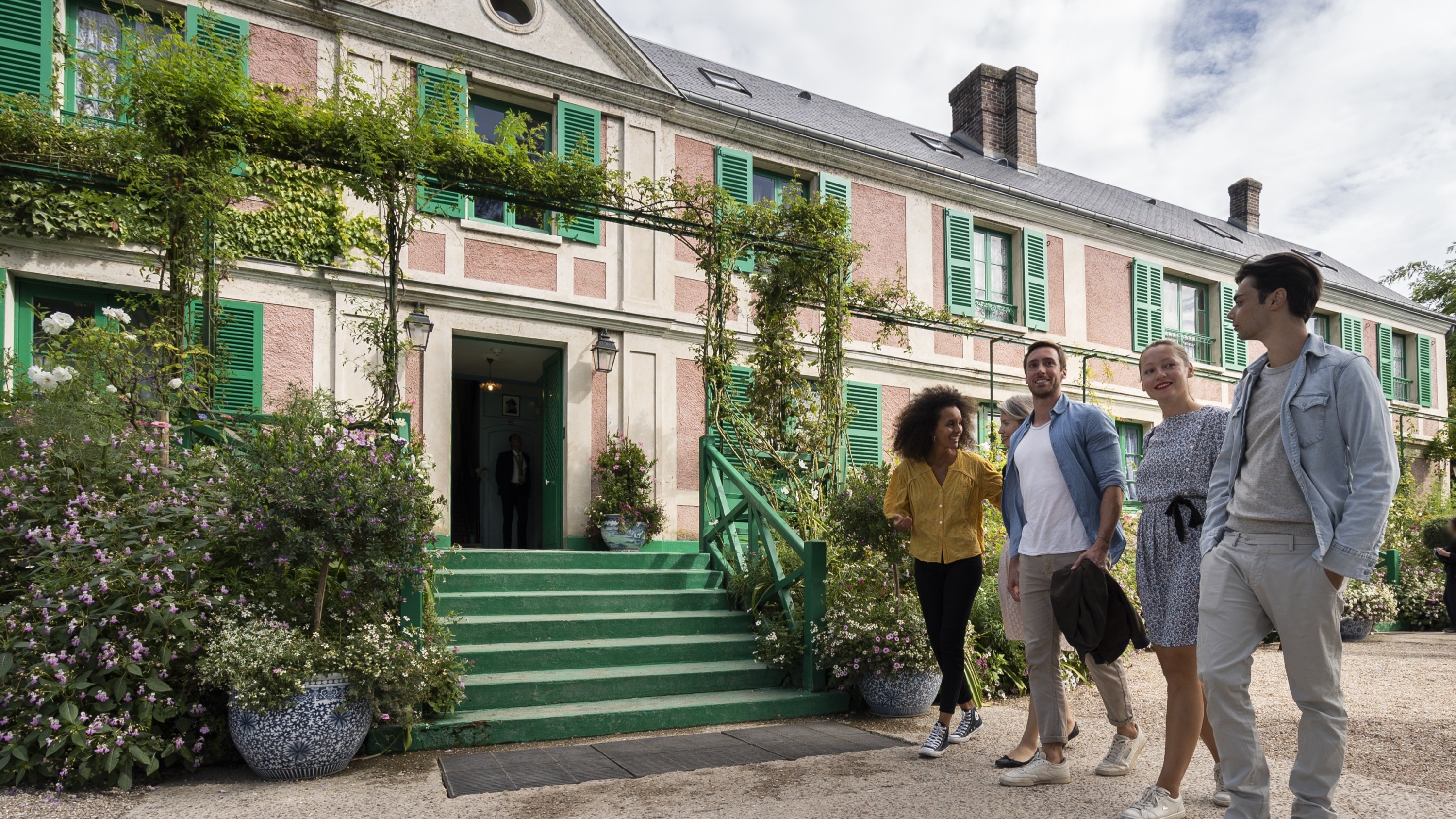 Step into Monet’s charming pink house and experience the vibrant heart of his artistry