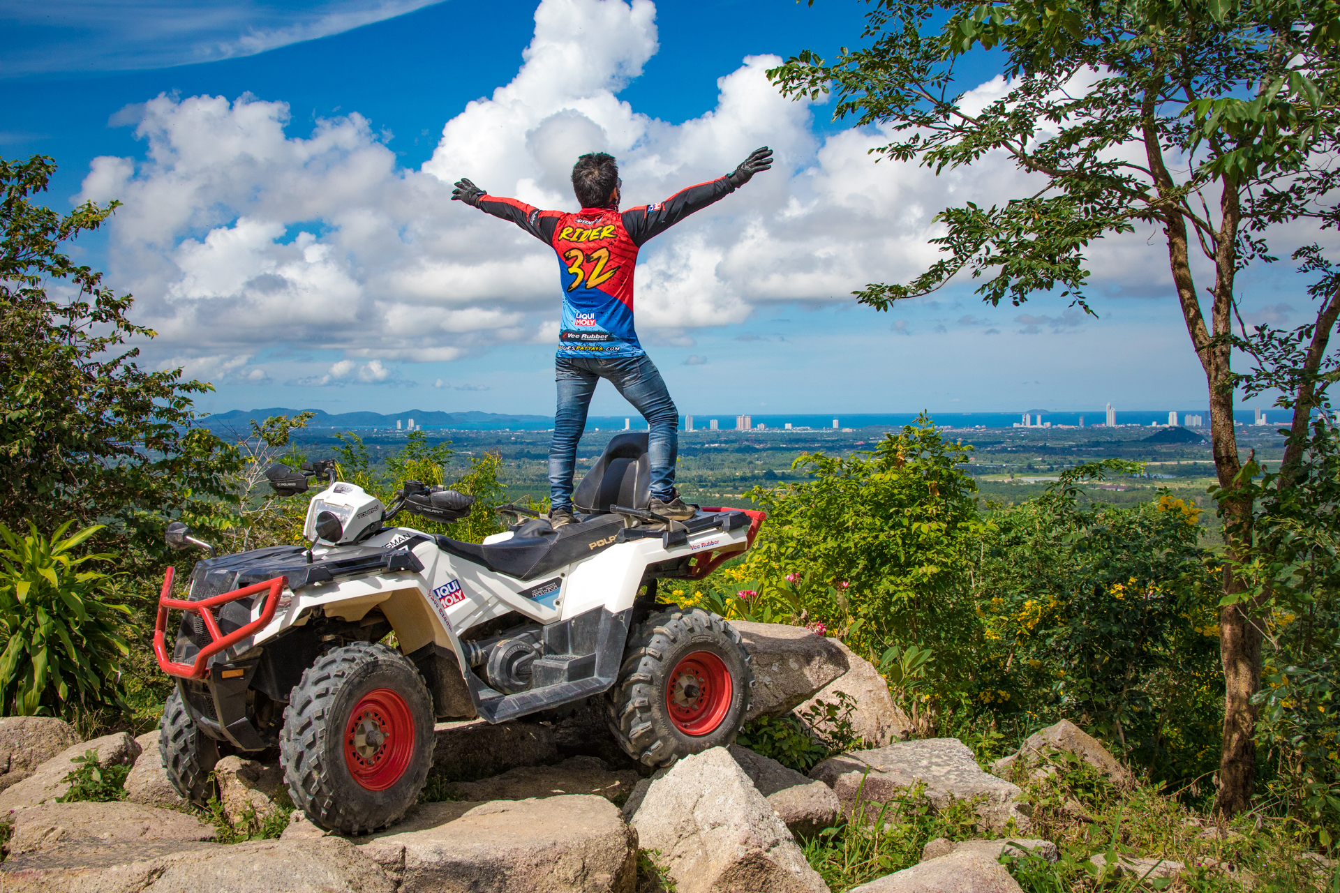 a man taking photo with ATV