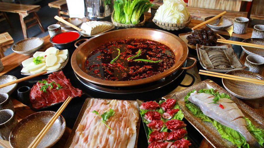 sichuan hotpot with ingredients for the chengdu private day tour