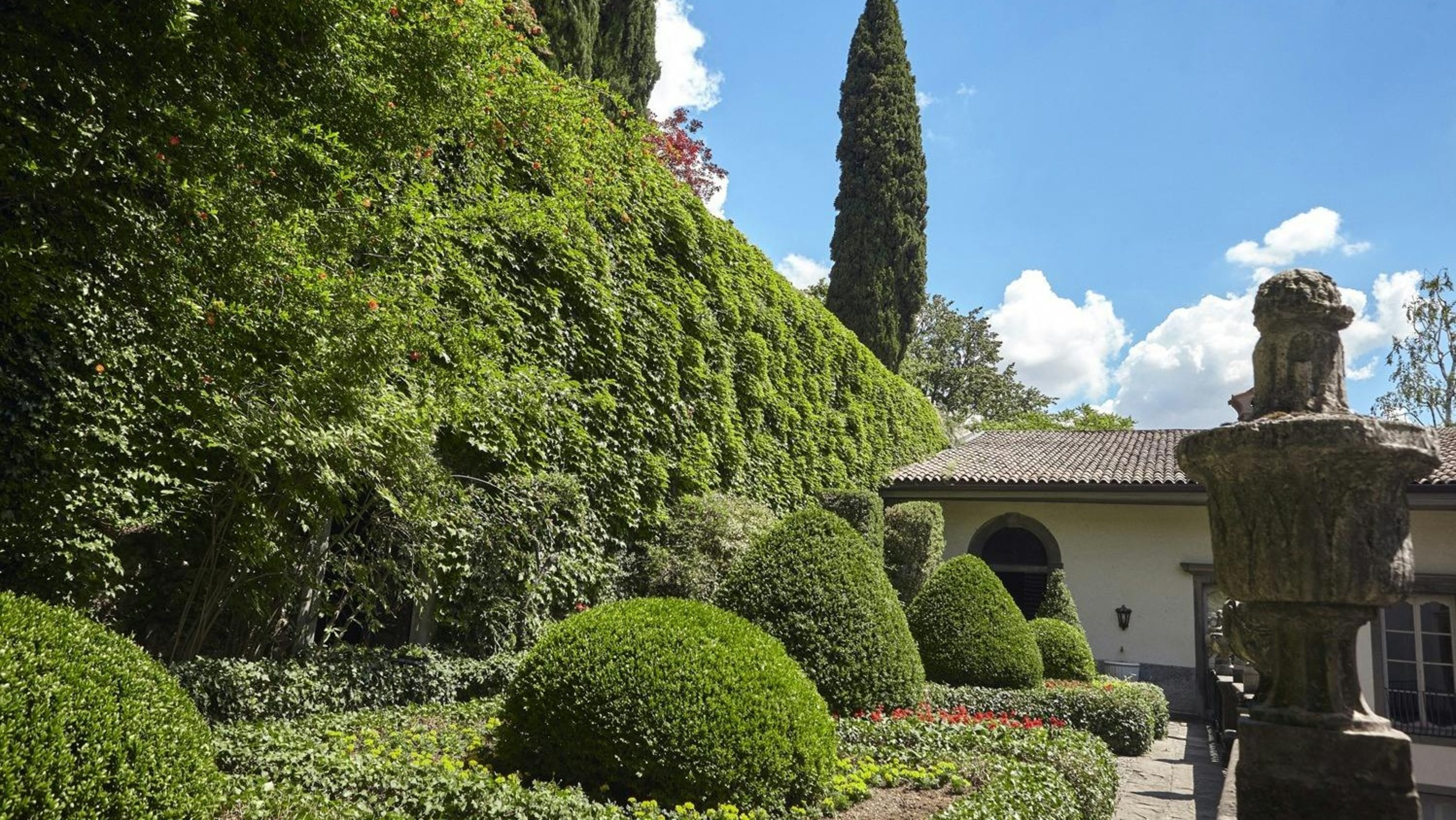 Wander through the meticulously sculpted gardens of Villa Valmarana ai Nani