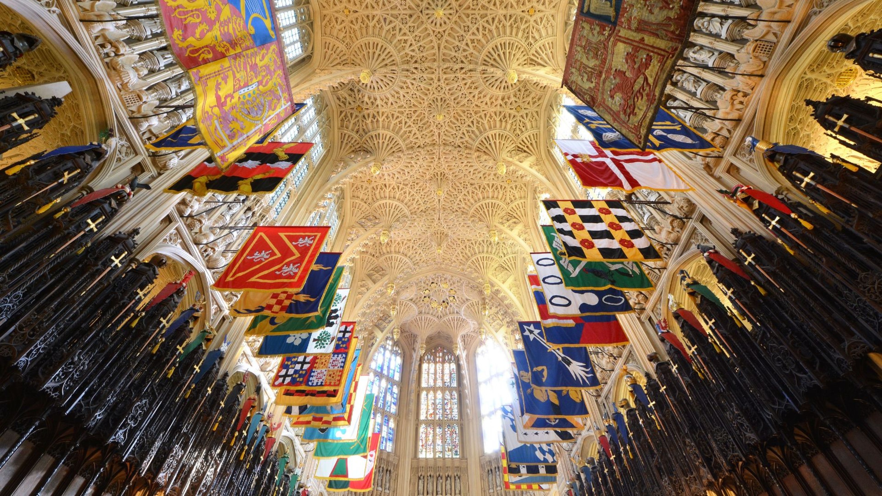 Behold the breathtaking fan-vaulted ceilings and vibrant banners of Westminster Abbey’s Lady Chapel