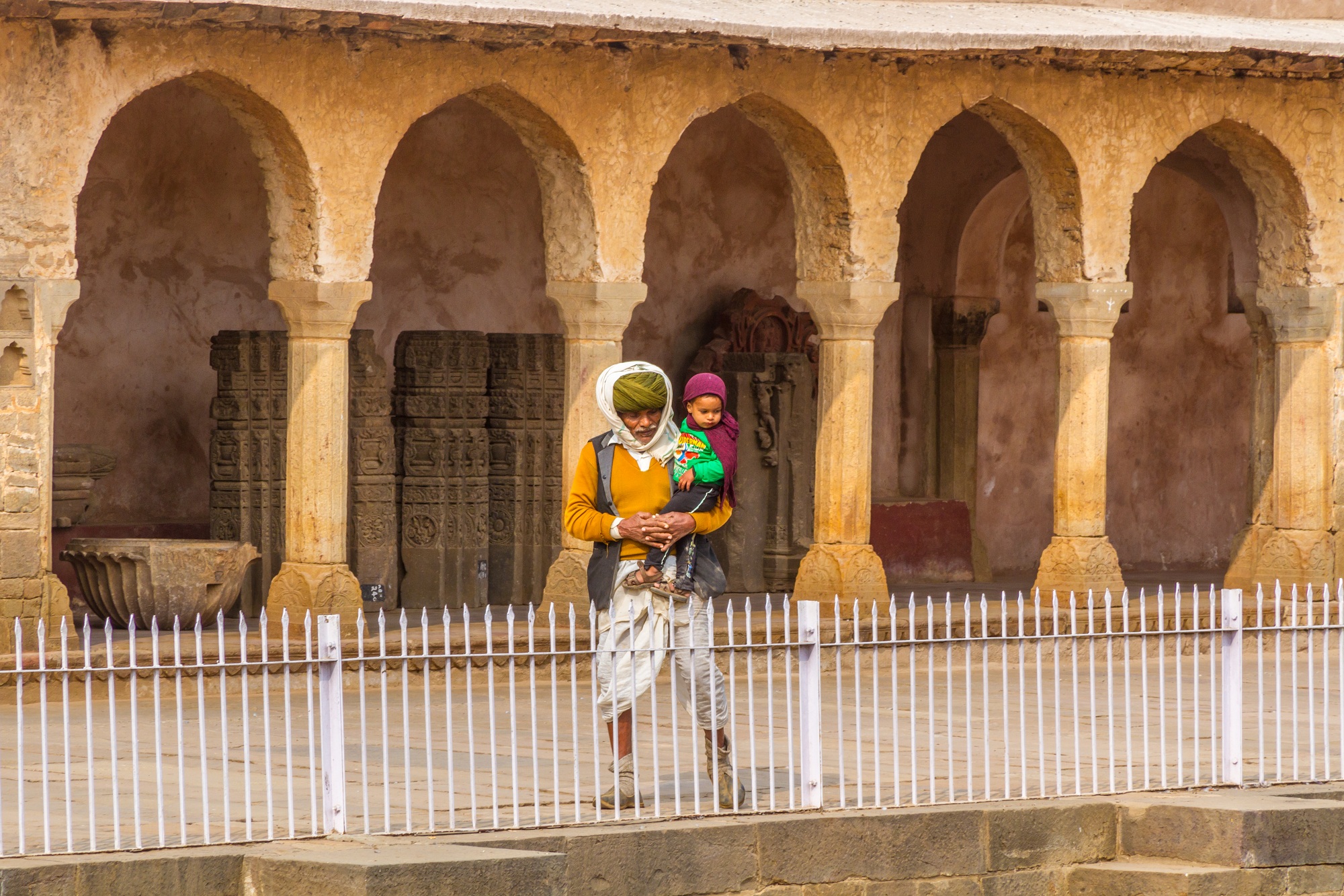 An Old Man And His Grandchild see the Chand Baori.