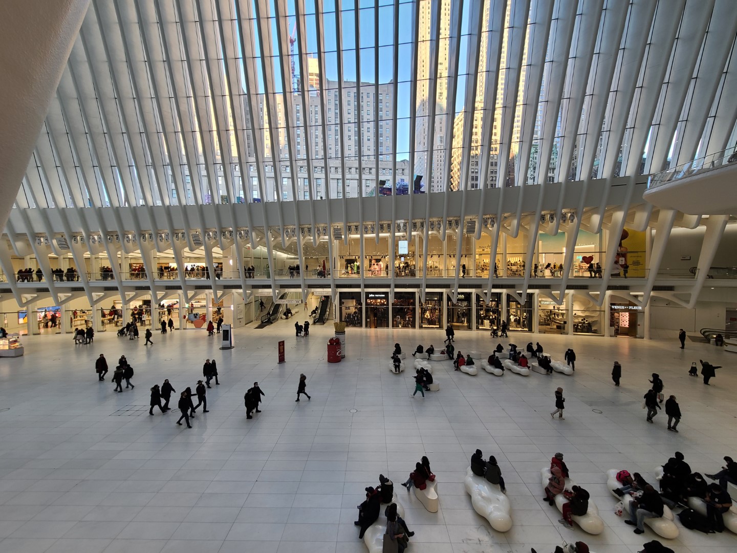 Fulton Center’s glass oculus reflects sunlight into the atrium, blending art and engineering