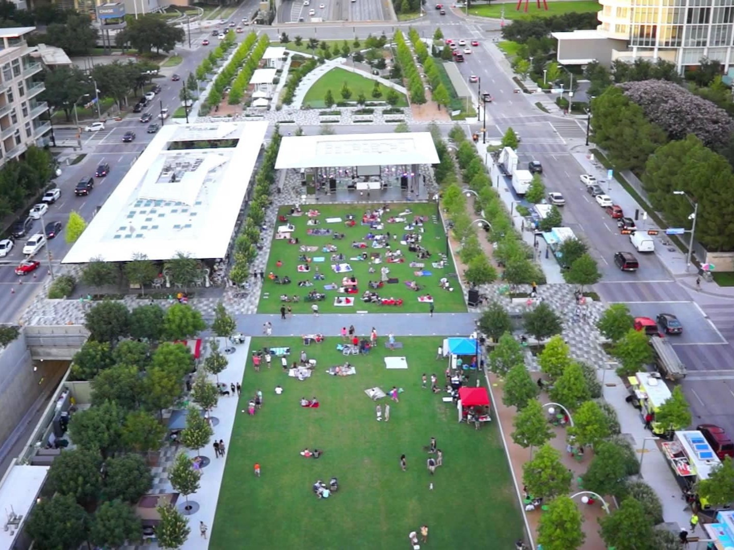 Relax and unwind at Klyde Warren Park, a vibrant urban green space built above a busy Dallas freeway
