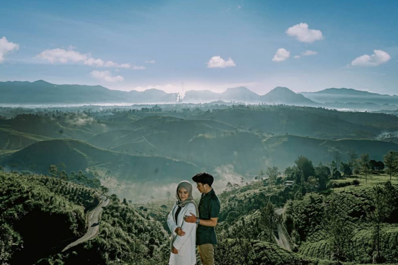 Man and woman in the mountains