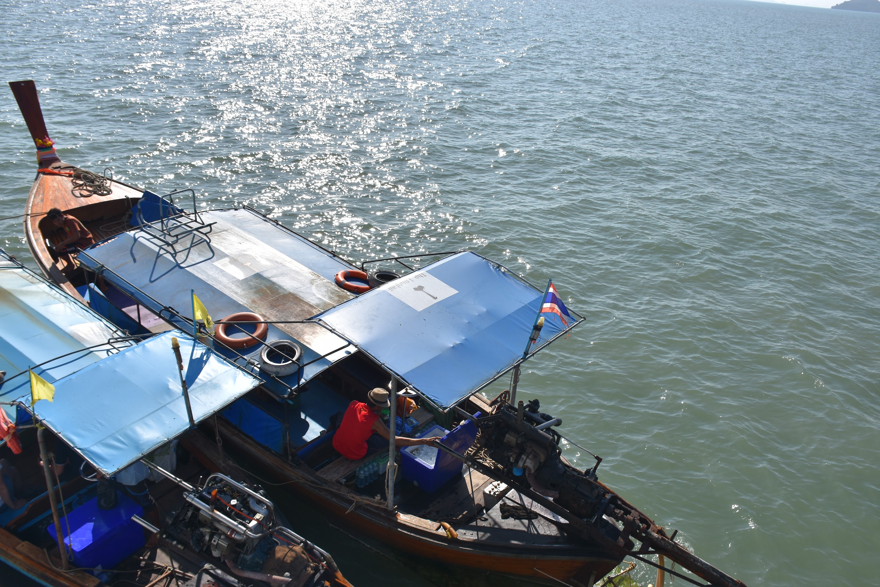 Climb aboard the longtail boat, and find a spot under the sun roof