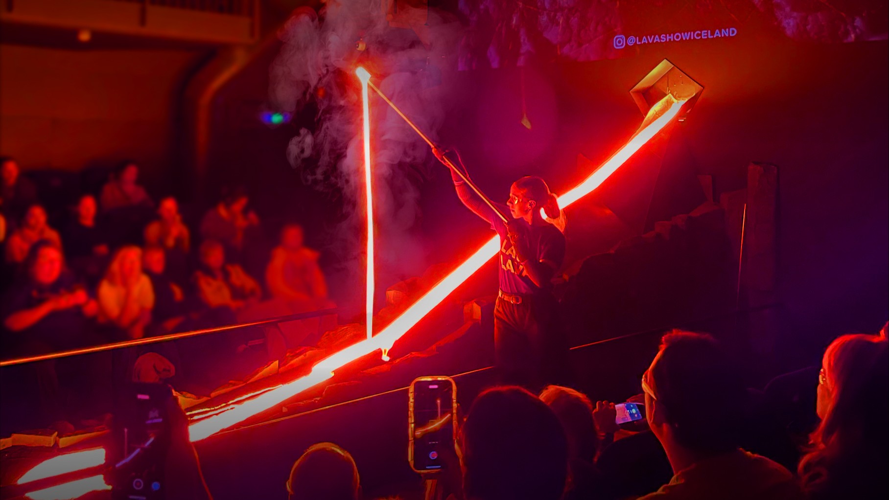 Molten lava cascades onto icy terrain, creating a mesmerizing fusion of fire and ice