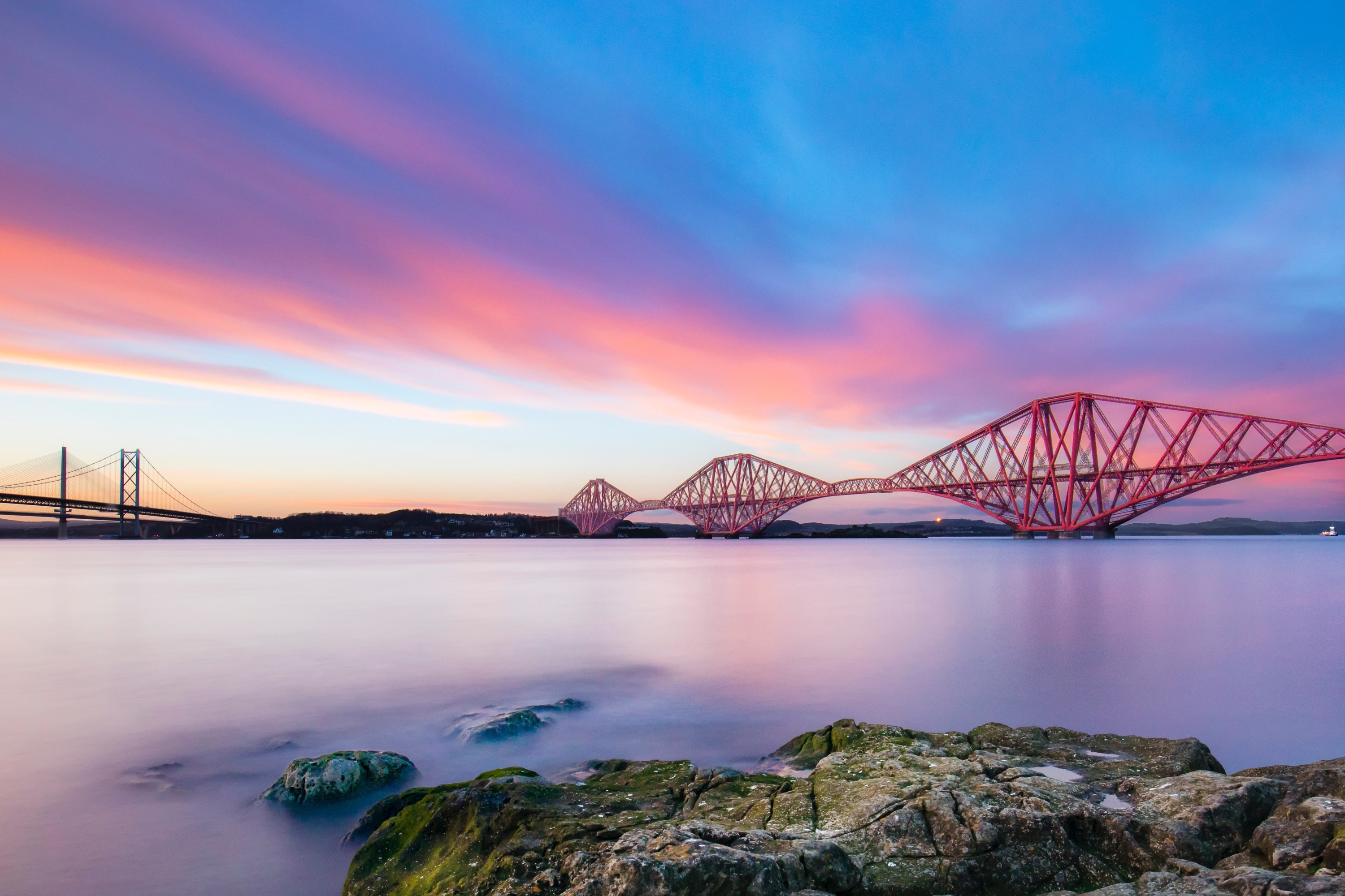Enjoy breathtaking views of the iconic Forth Bridges, spanning Scotland's majestic waters