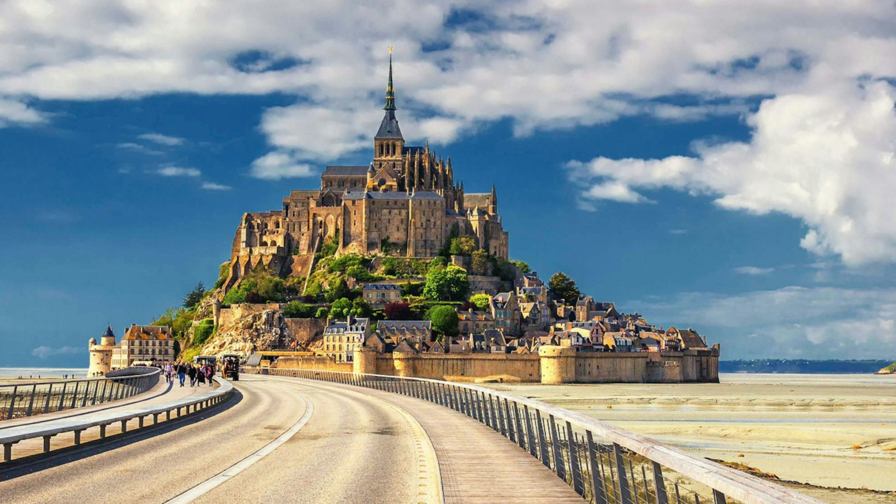 Admire intricate architecture in Mont Saint-Michel’s iconic churches and historic landmarks