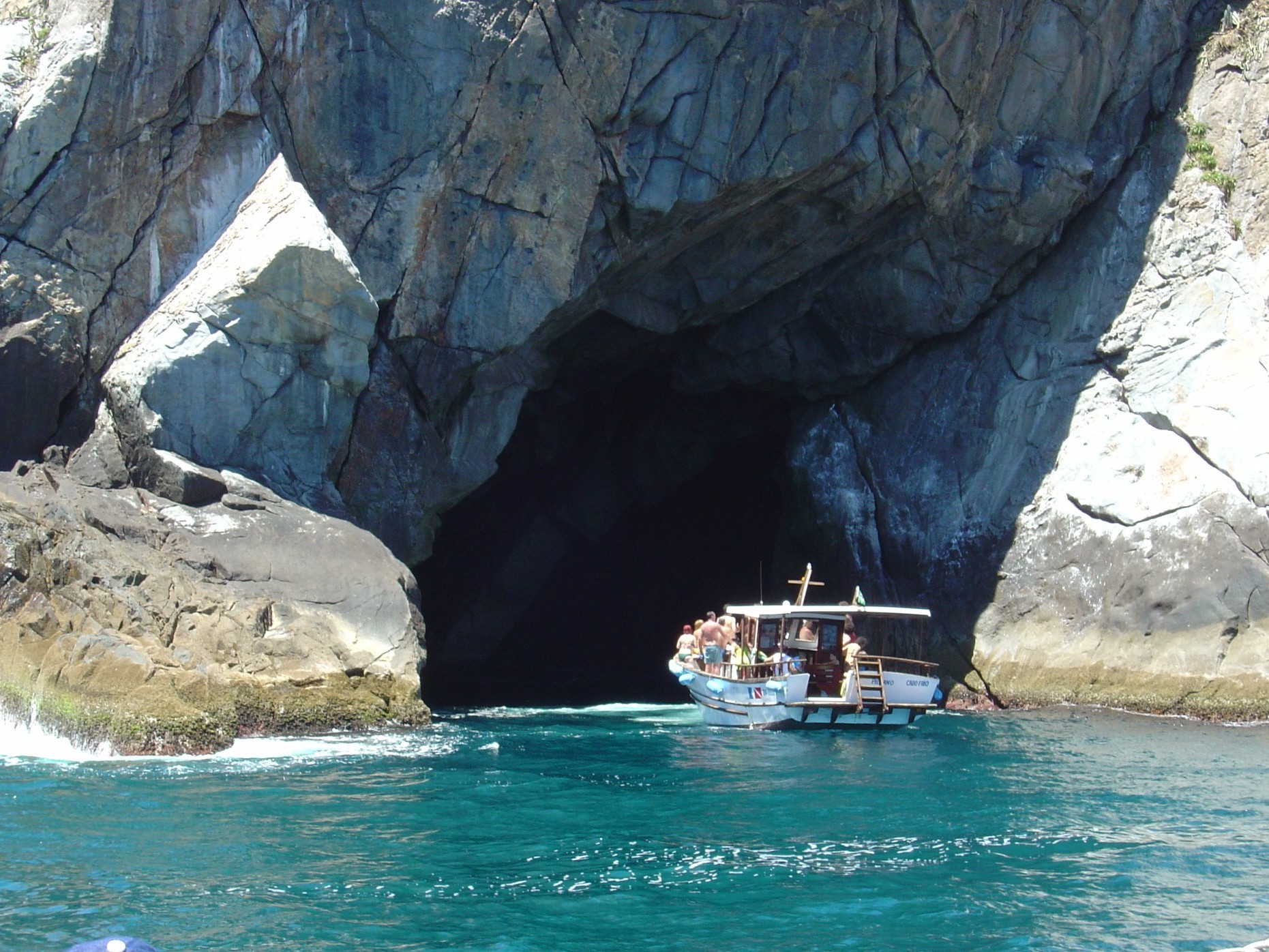 Explore a hidden sea cave in Arraial do Cabo’s dramatic rocky coastline