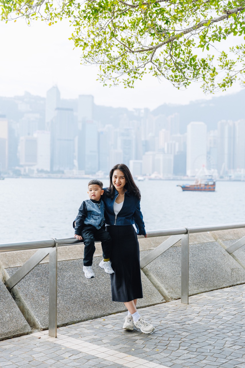 Capturing the bond between mother and son against the stunning skyline of Hong Kong.