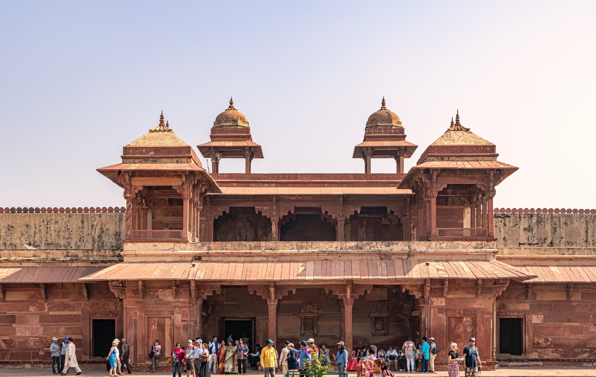 Tourists visiting Panch Mahal, Royal Palace in Fatehpur Sikri.