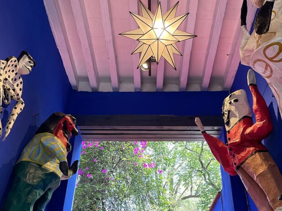 Art enthusiasts wandering through Anahuacalli Museum, admiring Diego Rivera’s fascinating collection of artifacts