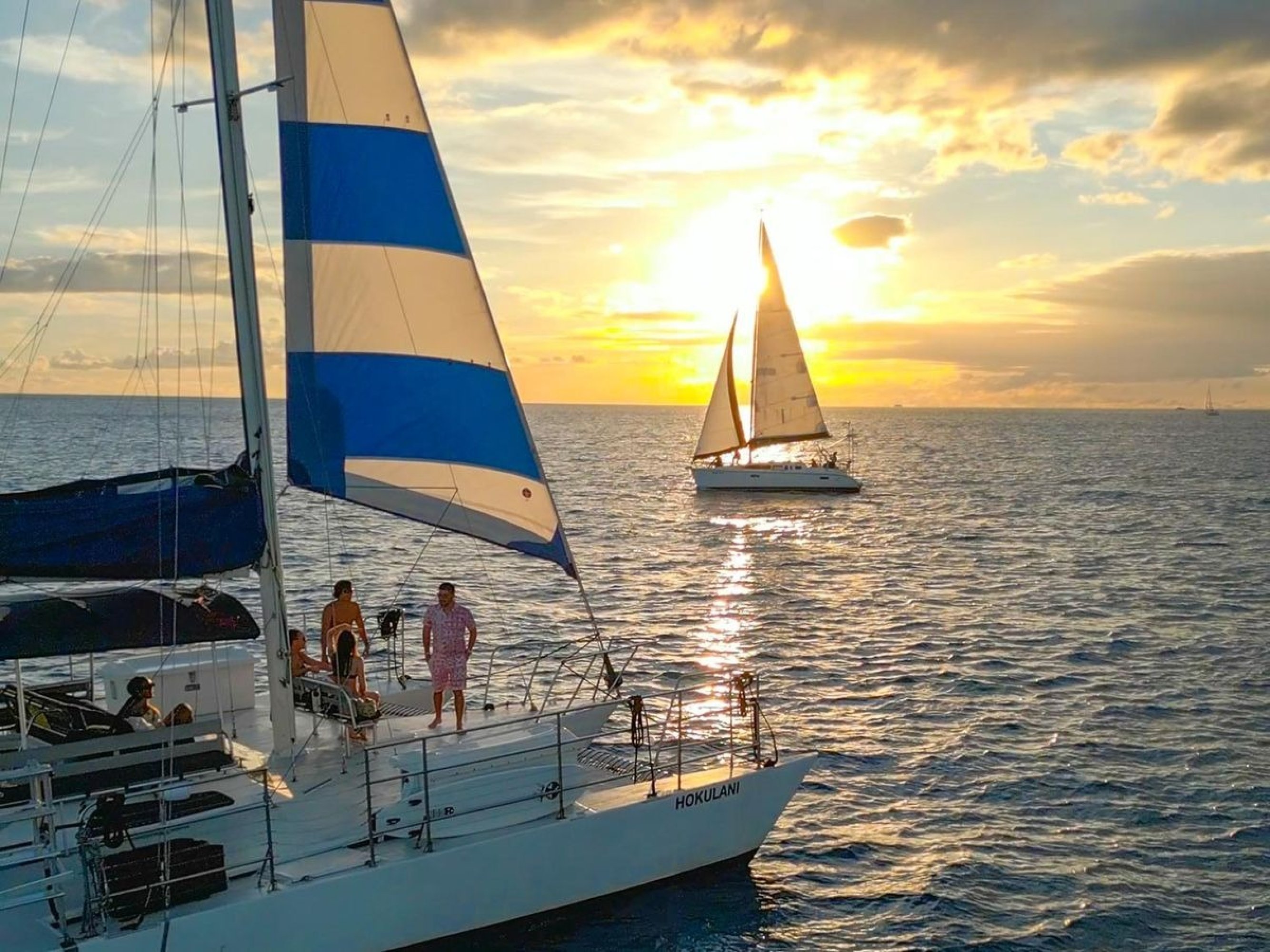 Watch Honolulu’s skyline shimmer as fireworks reflect off gentle ocean waves