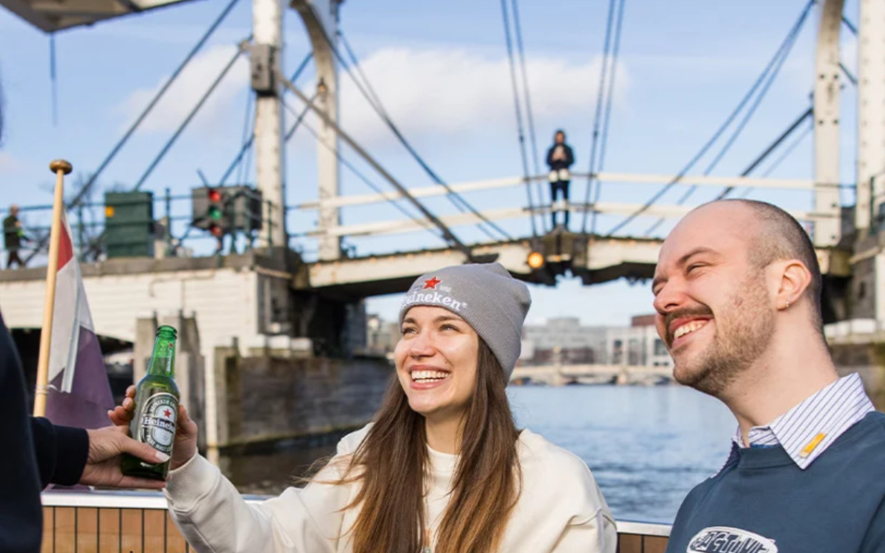 Heineken Canal Cruise + Live Guide Experience in Amsterdam